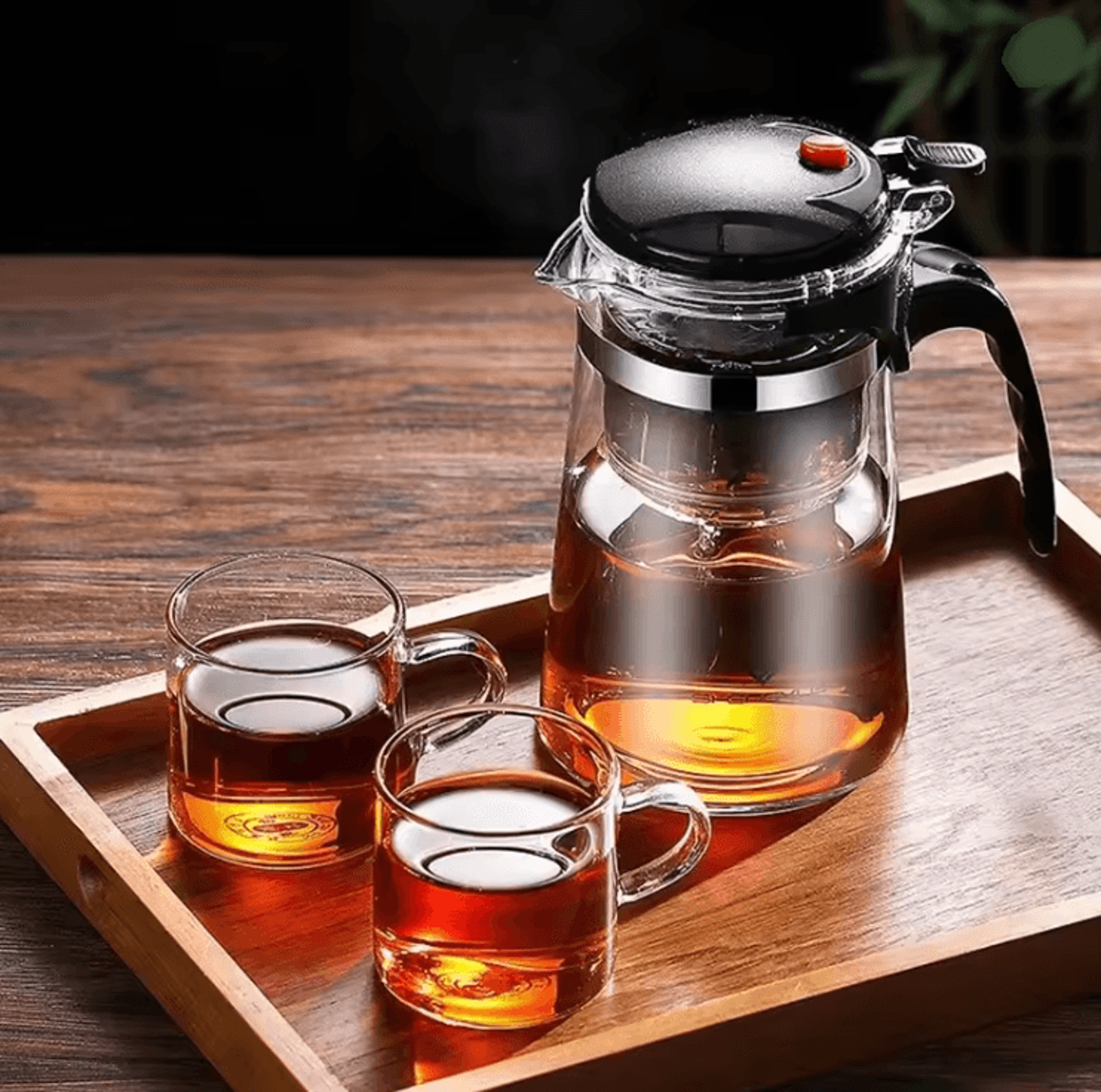 glass teapot with built in filter for loose leaf tea and herbal brewing