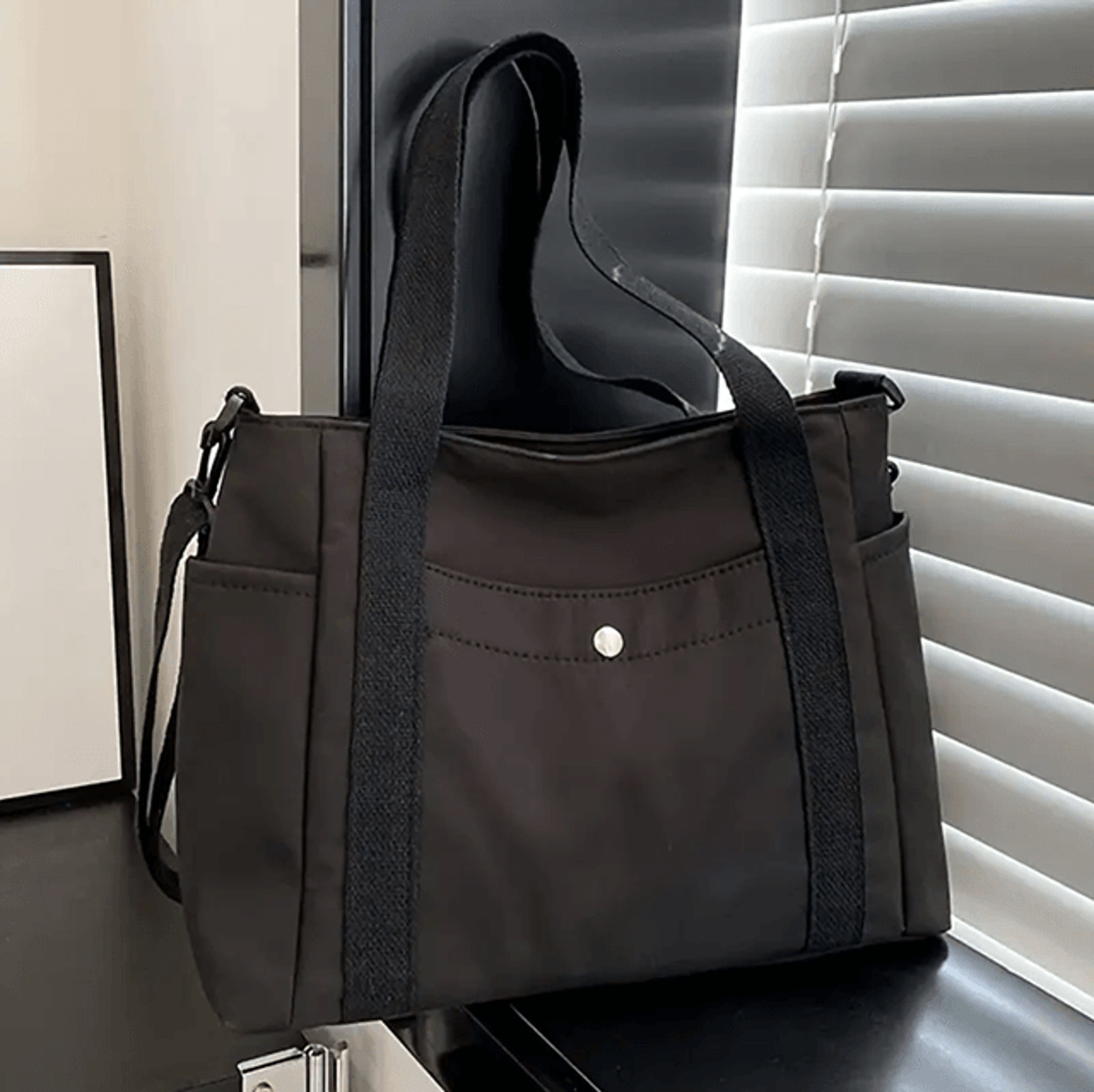 large capacity nylon crossbody bag with adjustable shoulder strap