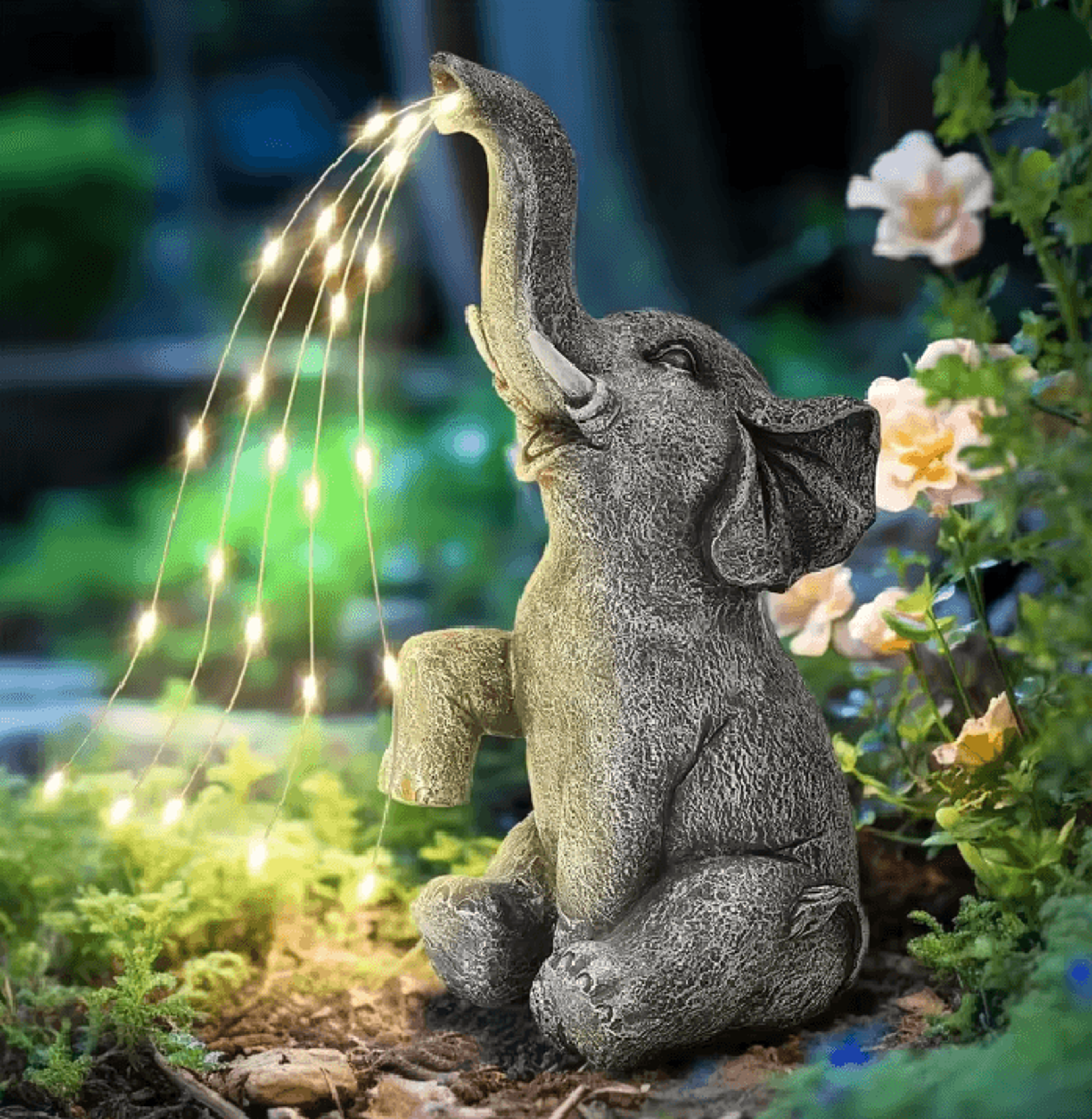 elelight solar elephant statue with string lights for garden and patio decor