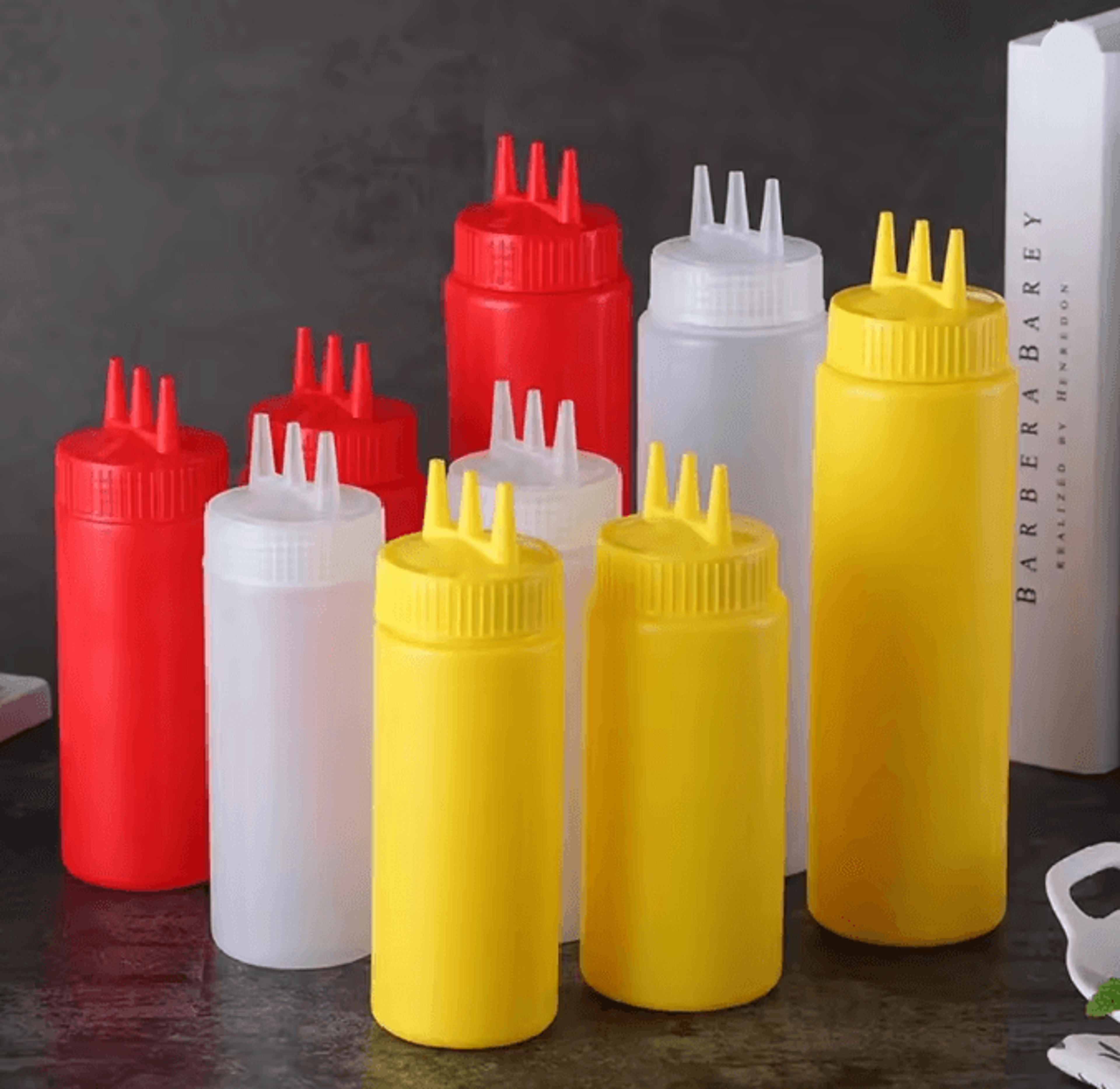 squeezable sauce bottle with nozzles