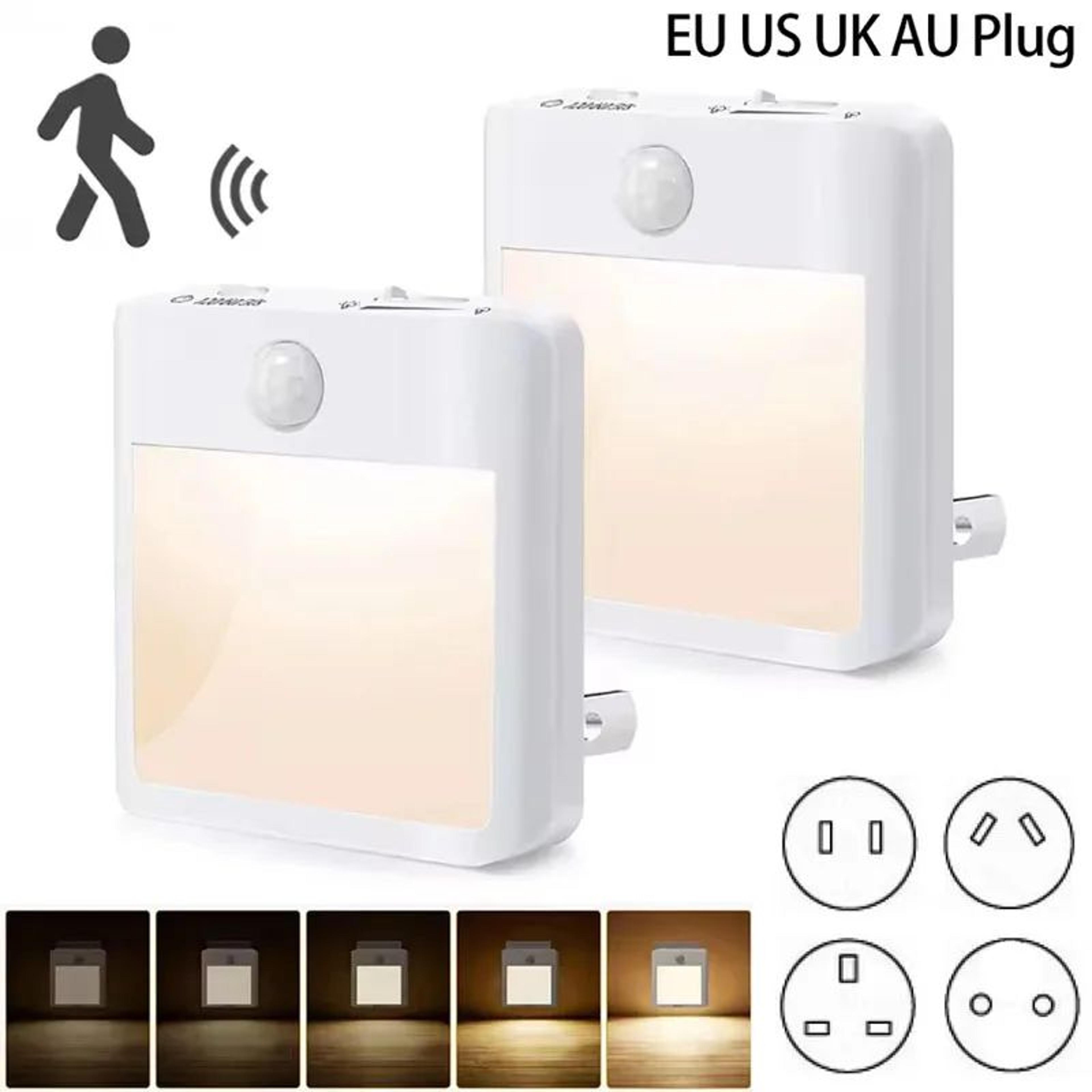 warm white motion sensor plug in night light