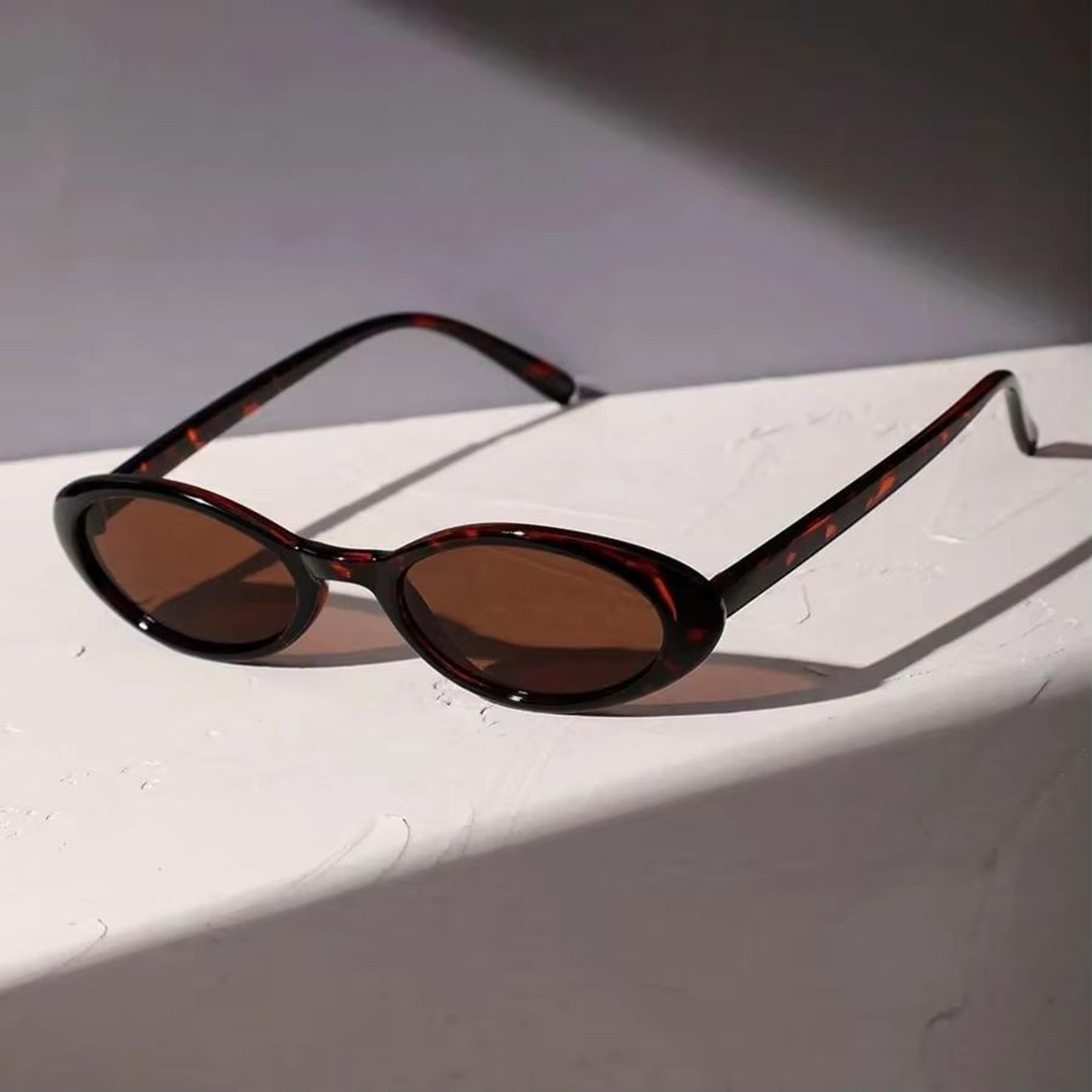 leopard luxe oval sunglasses – small frame brown leopard print for women & men