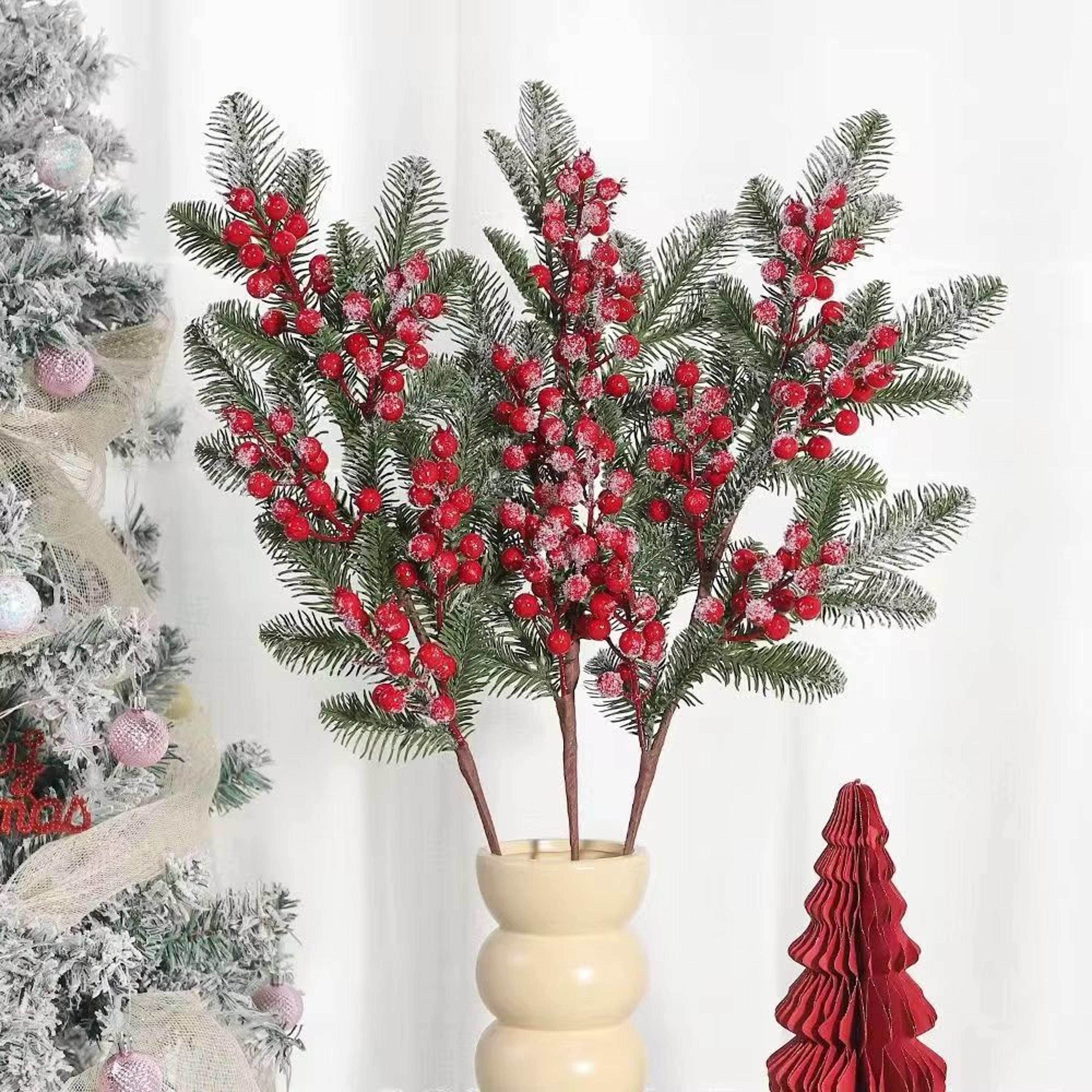 green and red christmas pine branch picks for diy holiday decor