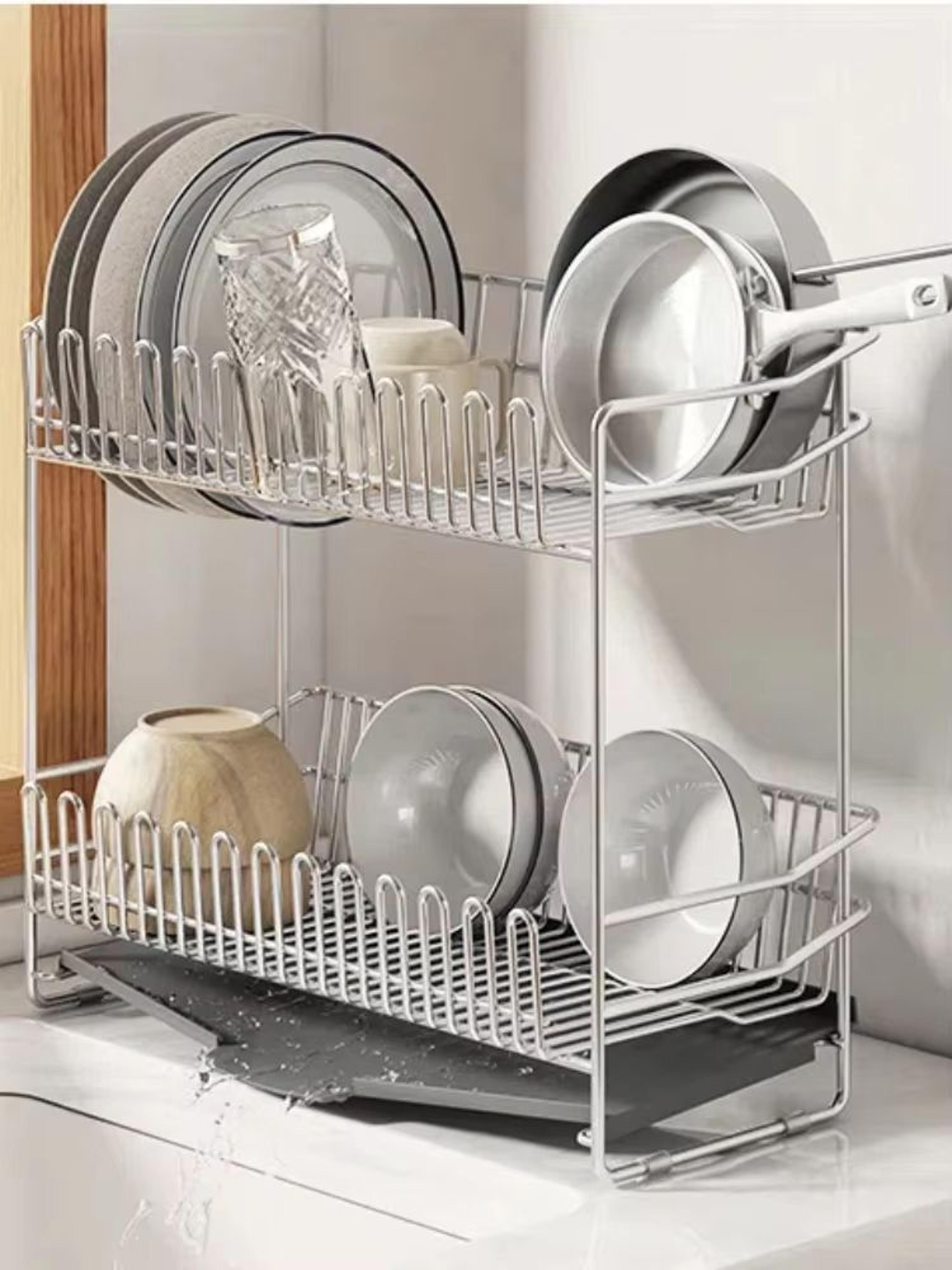 stainless steel dish drying rack over the sink with tray