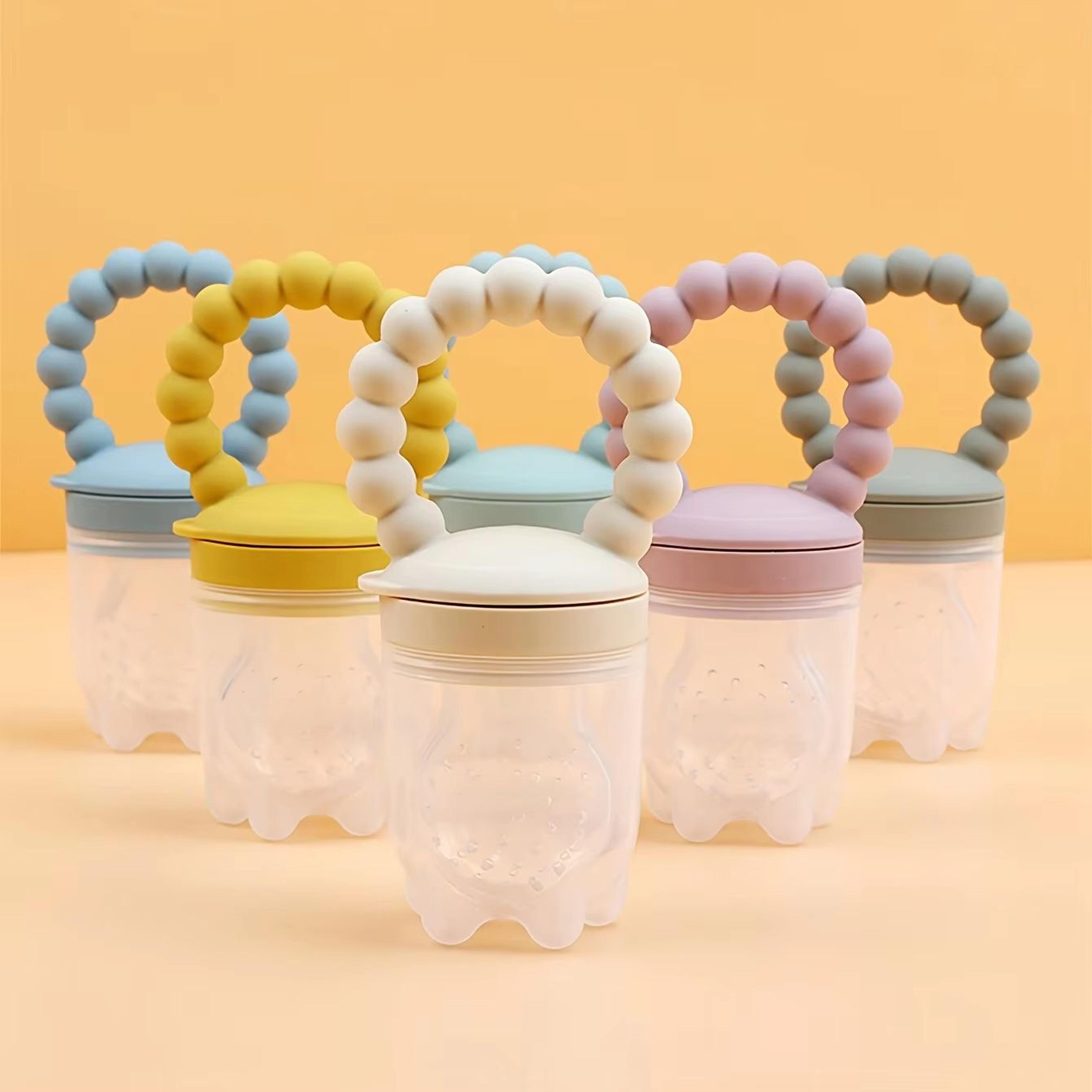 4-piece silicone baby fruit feeder with easy-grip handle and extra pouches