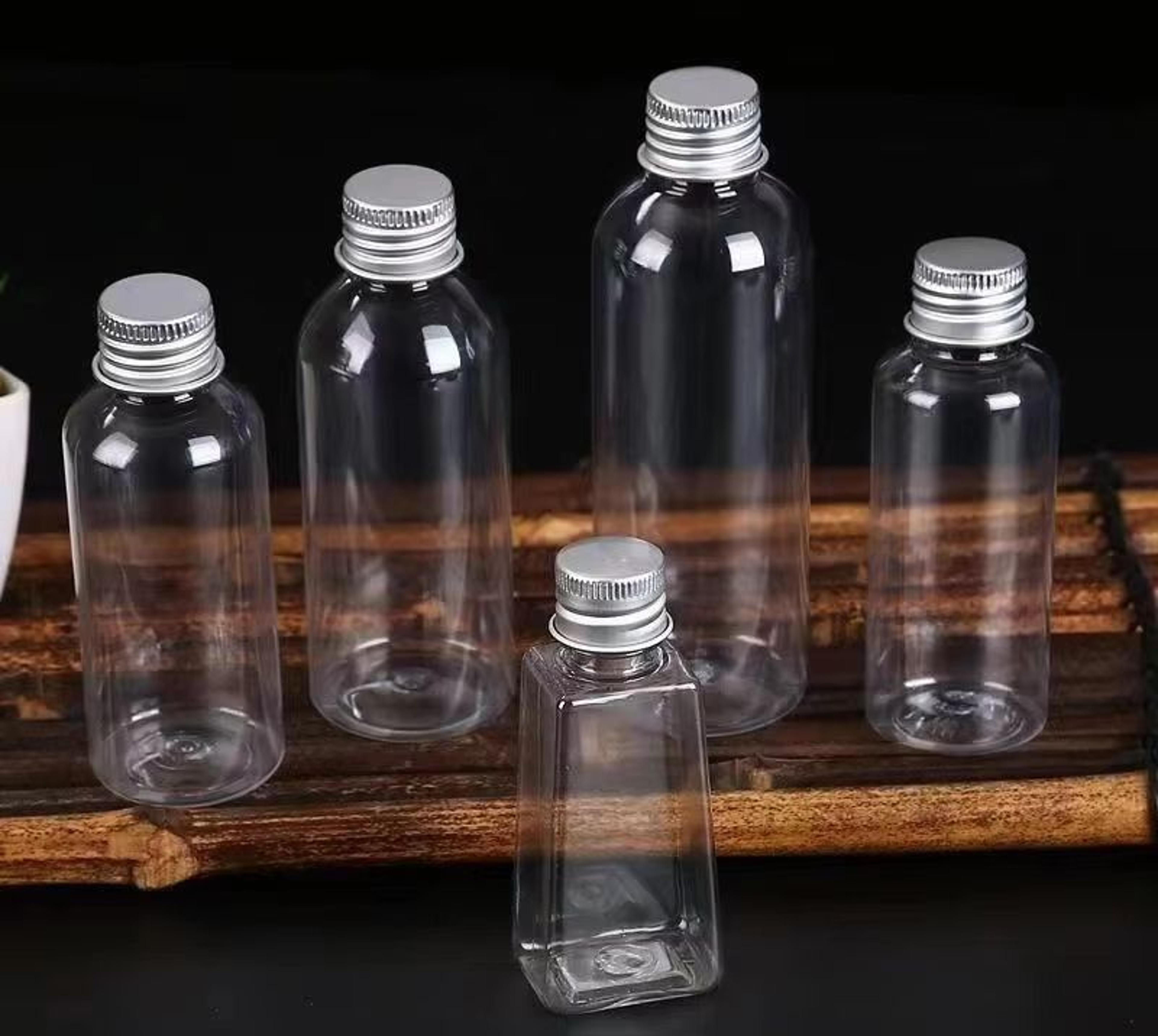 50-piece clear plastic bottle set with aluminum caps for travel, lotion, shampoo and cosmetic storage