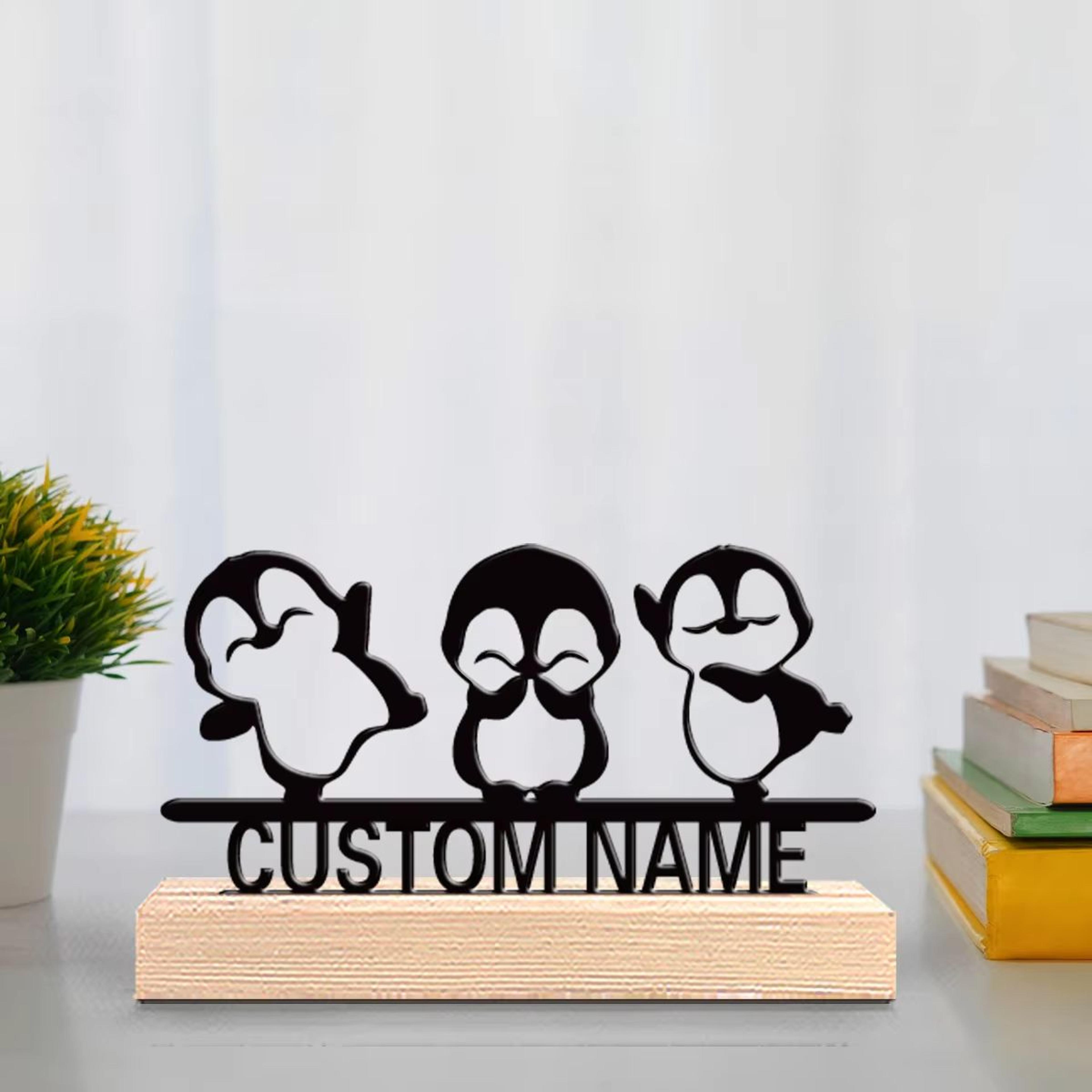custom three penguin metal statue with wooden base for office and home decor