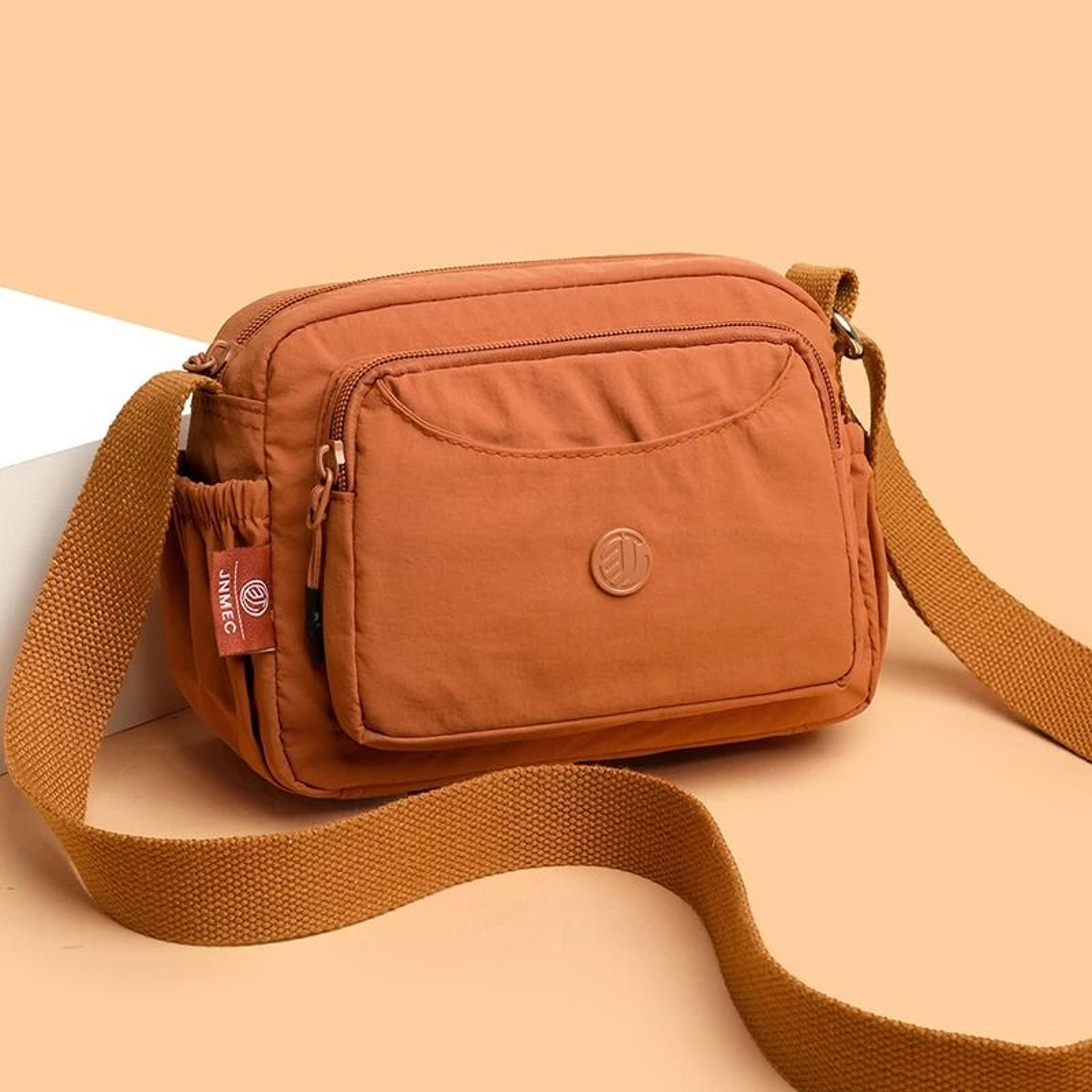 waterproof nylon crossbody shoulder bag for women with multi pocket casual everyday design