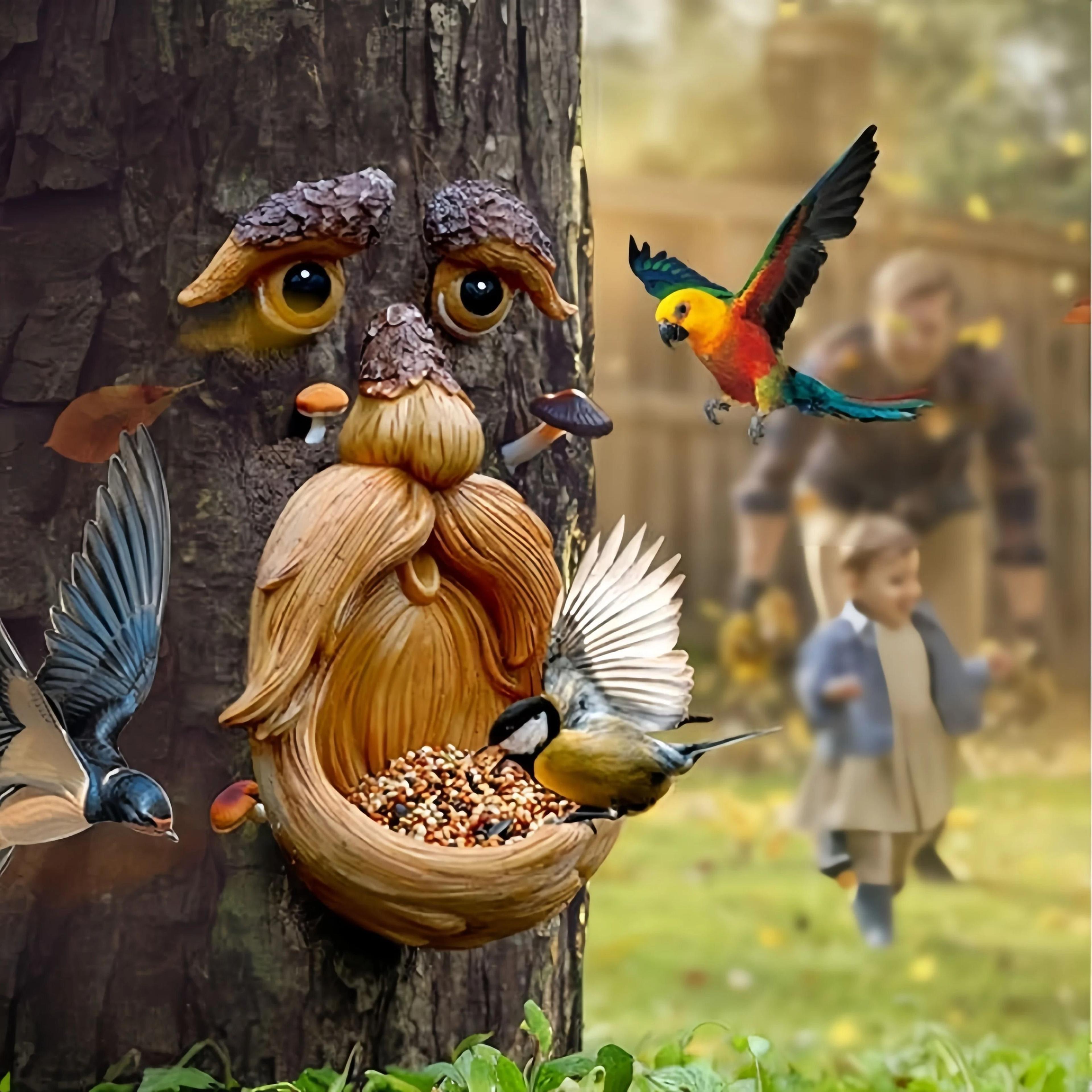 whimsical outdoor tree face garden decoration