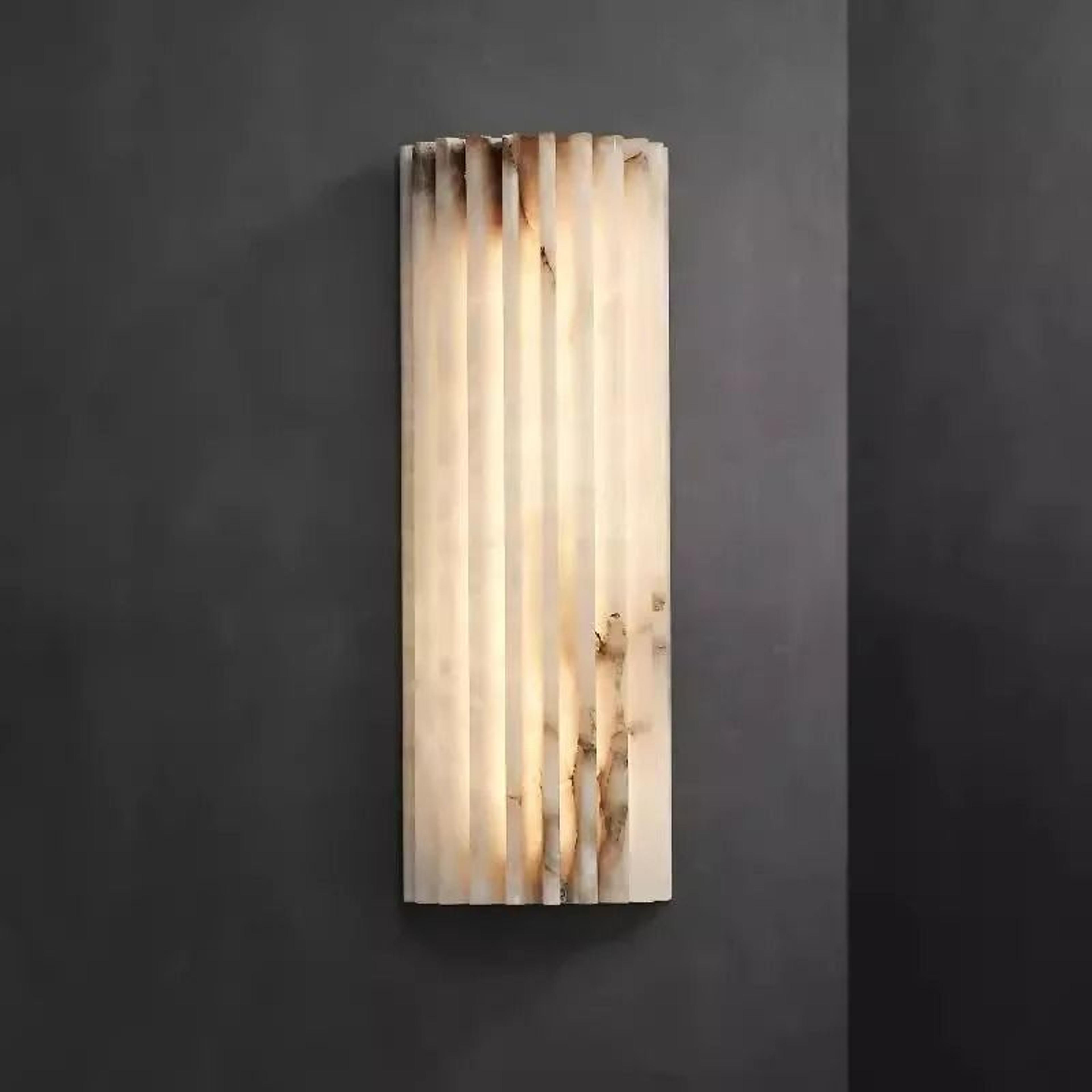 sculpted marble art deco sconce
