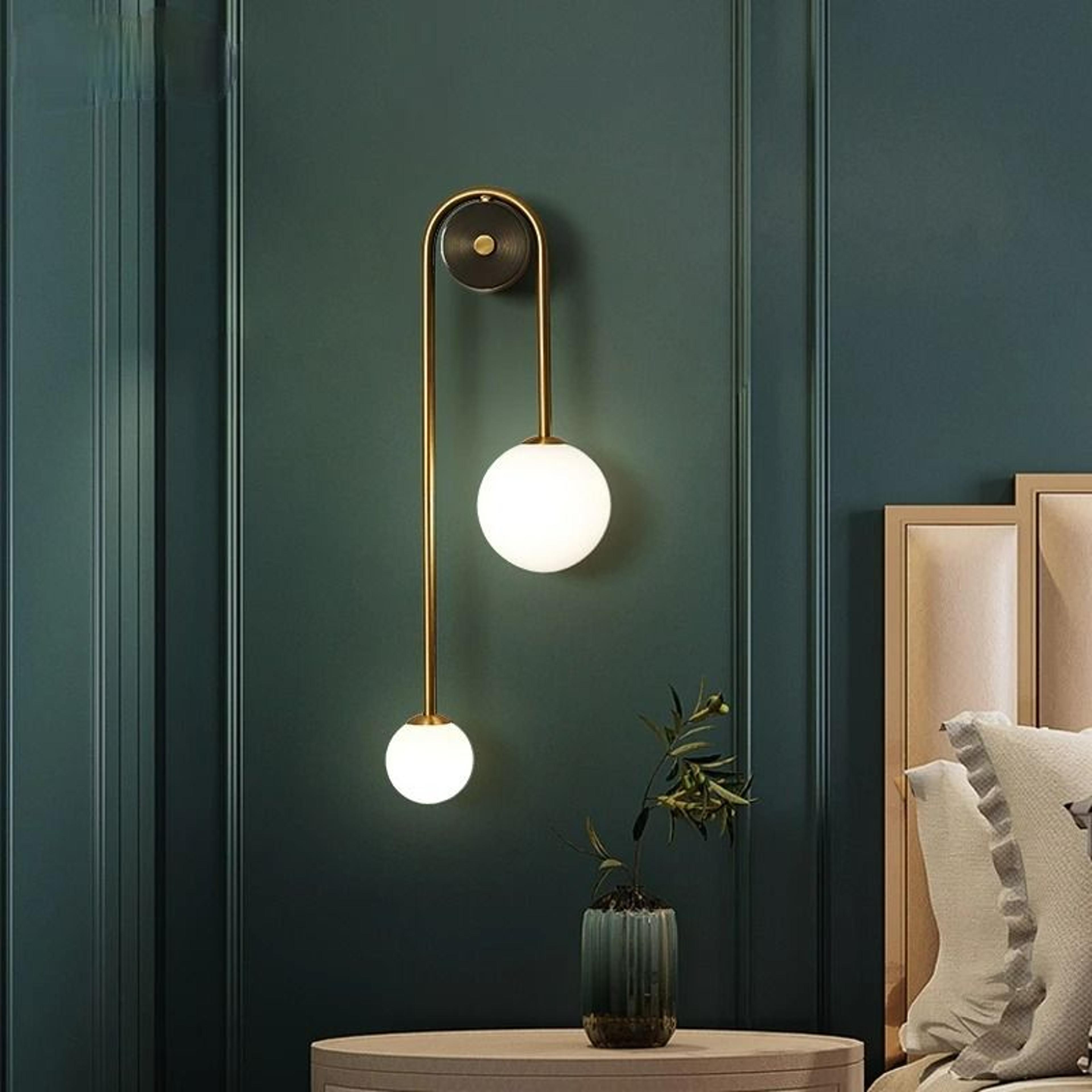 solara gold glass orb sconce