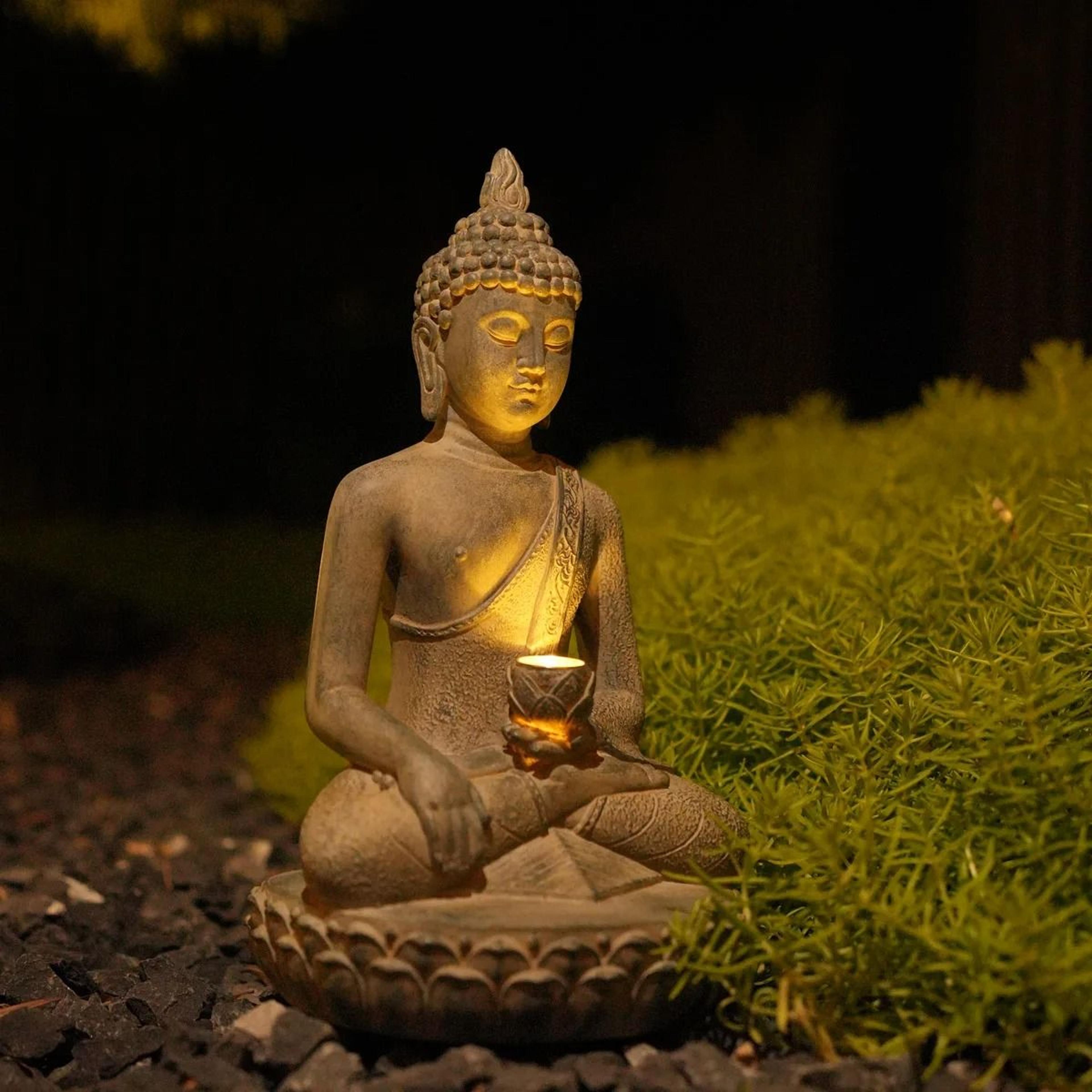 zen inspired solar buddha statue for outdoor garden and entryway decor