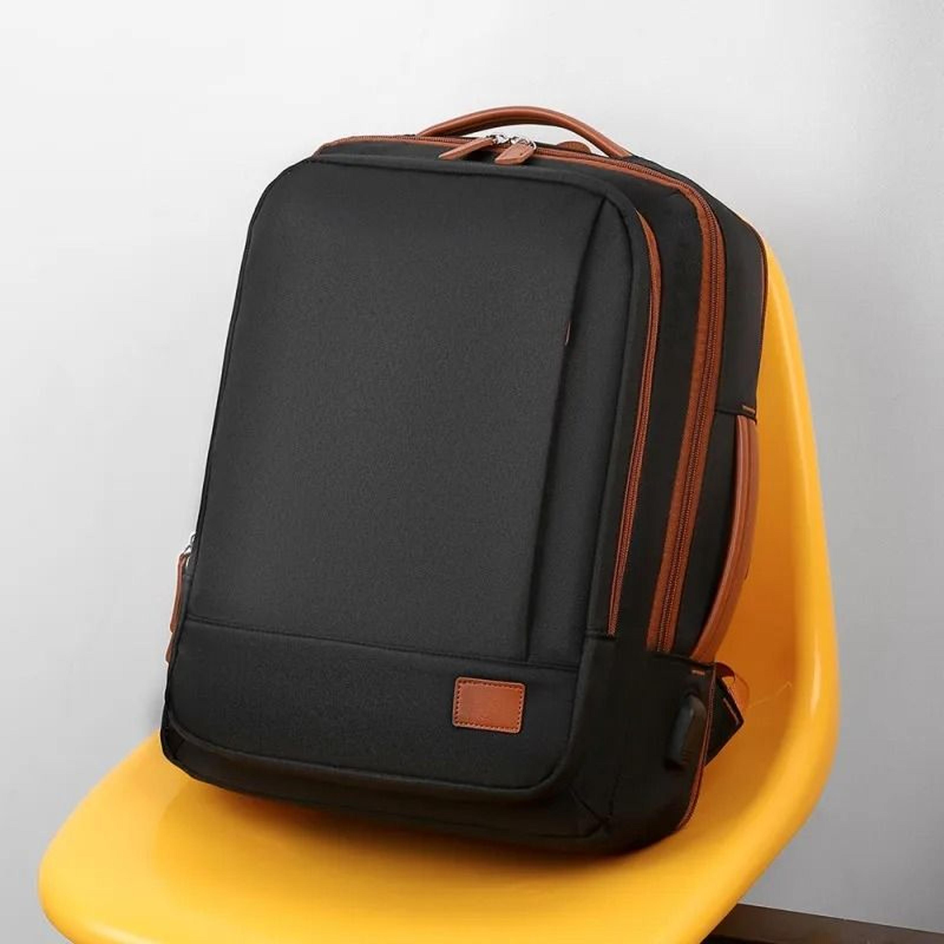 large capacity expandable travel backpack with laptop compartment