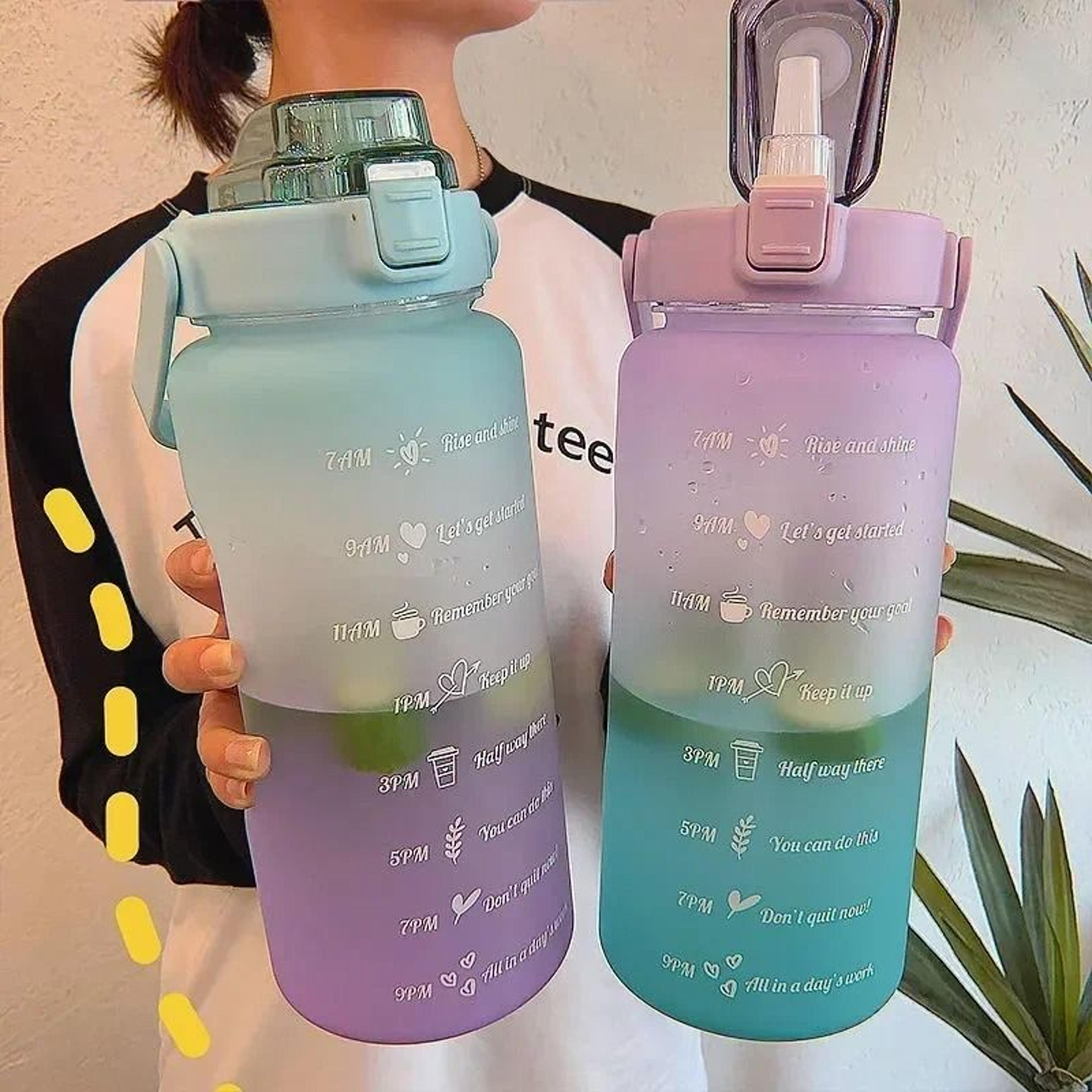 large capacity sports water bottle with straw and time marker for fitness and outdoor use