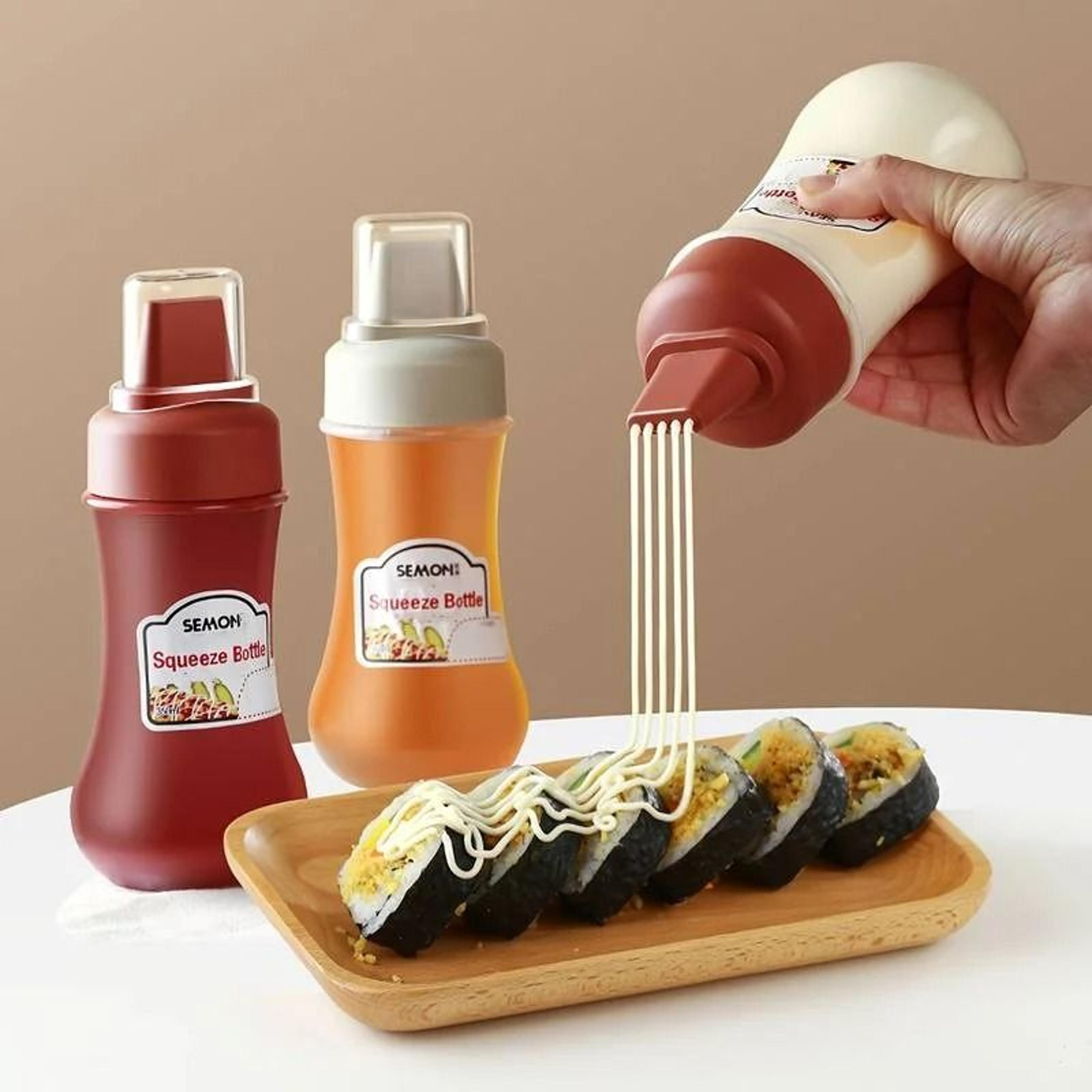 leak-proof squeeze sauce bottle and refillable condiment container for kitchen prep