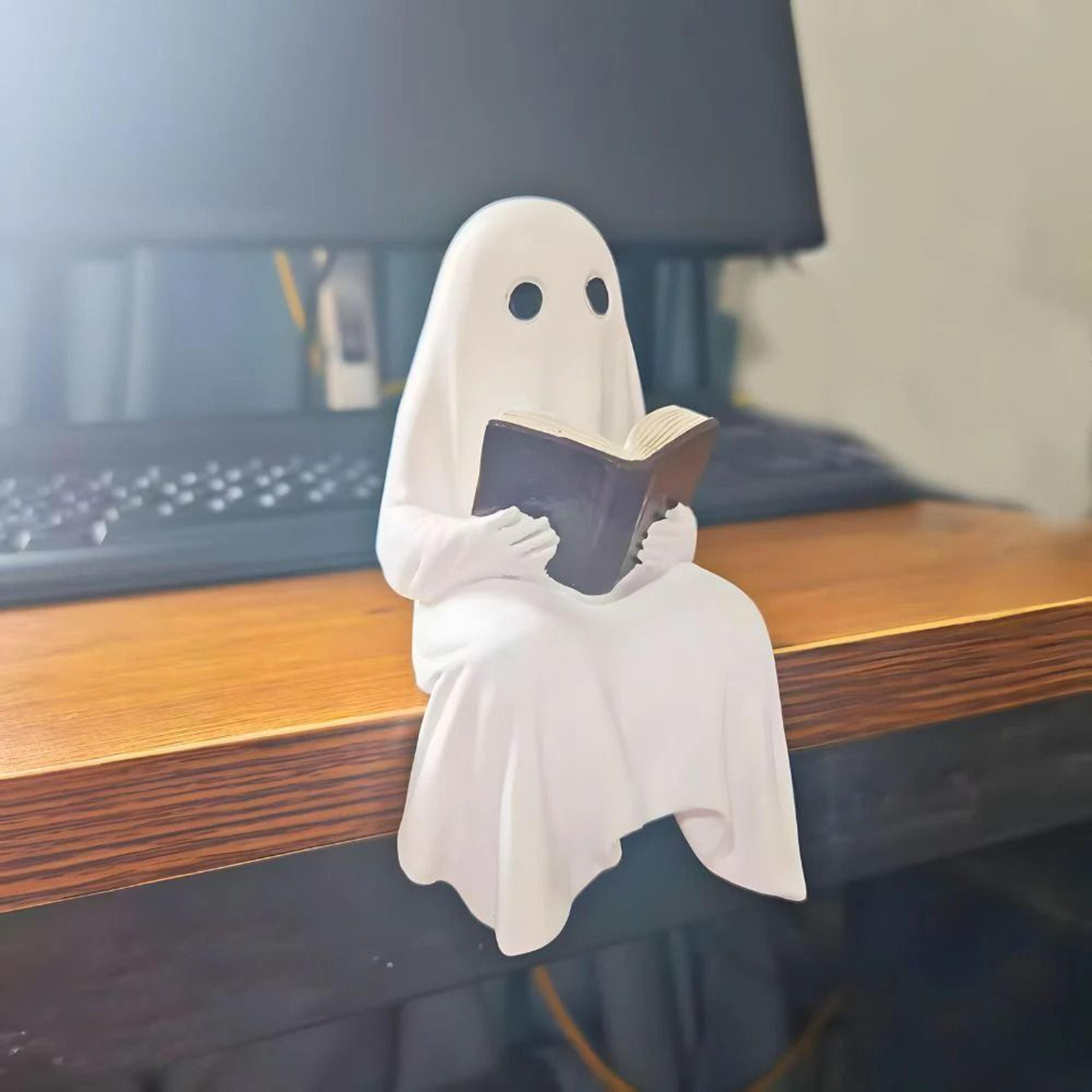 cute little ghost reading a book resin statue for halloween home decor