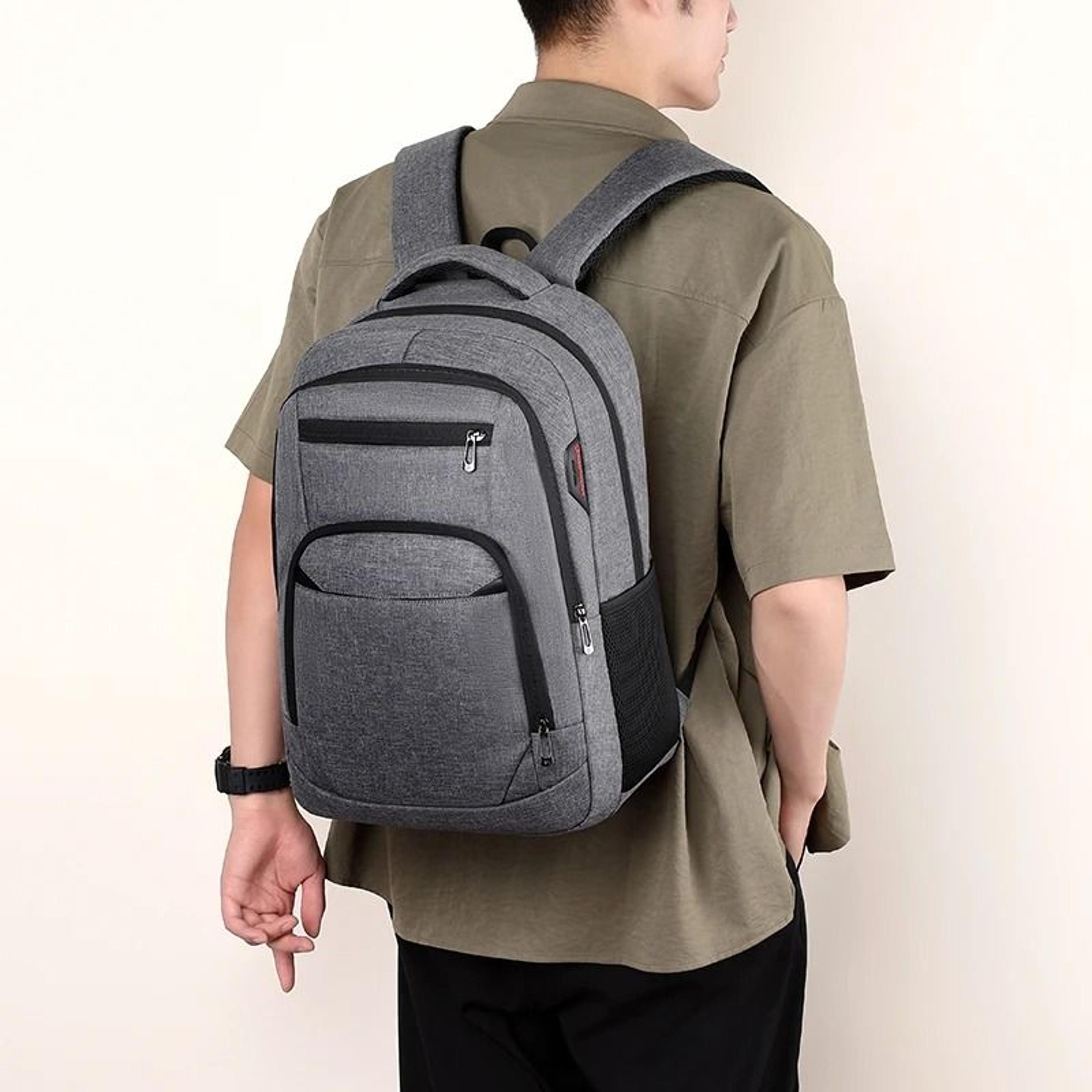 large capacity travel backpack with laptop compartment