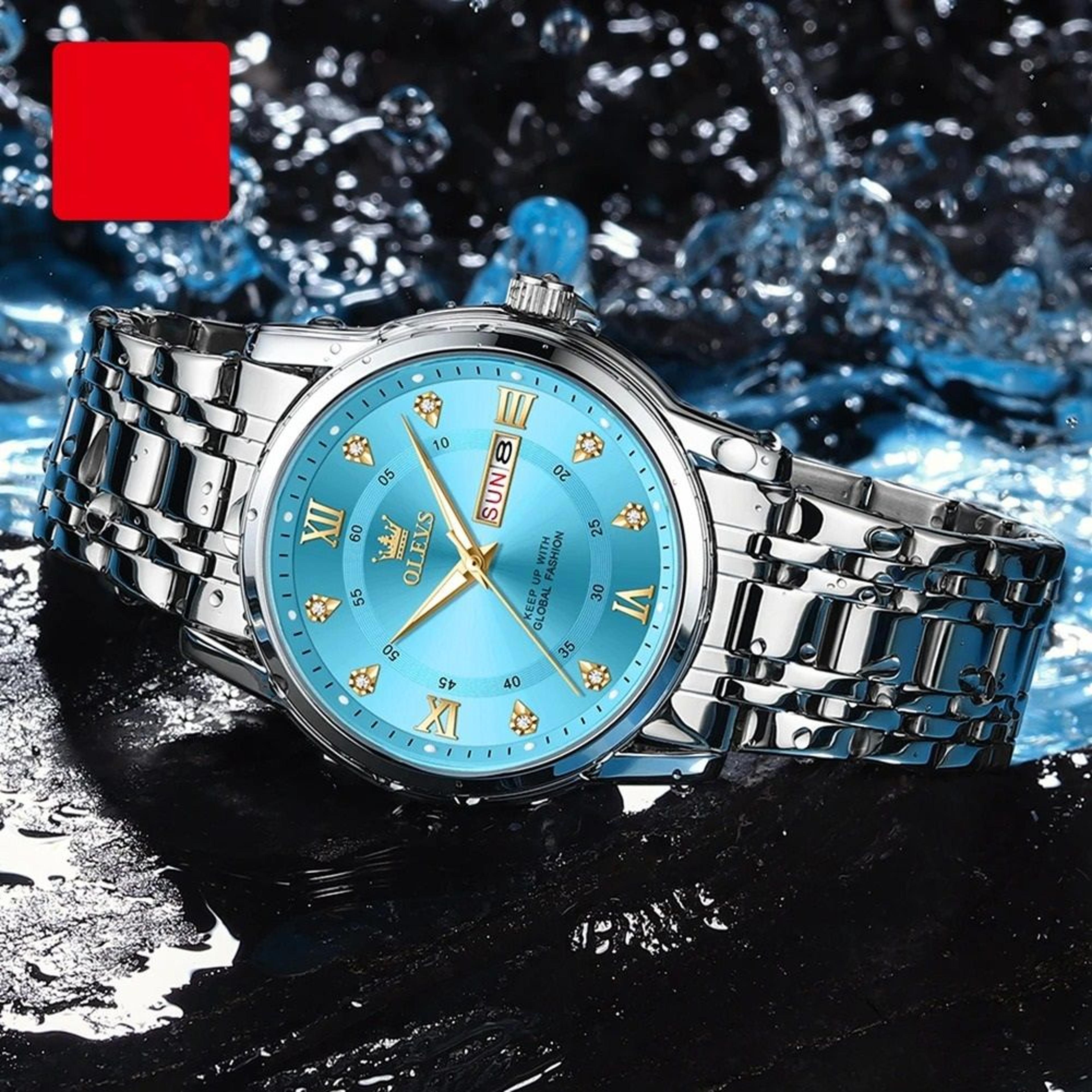 diamond accent quartz watch with dual calendar and roman dial