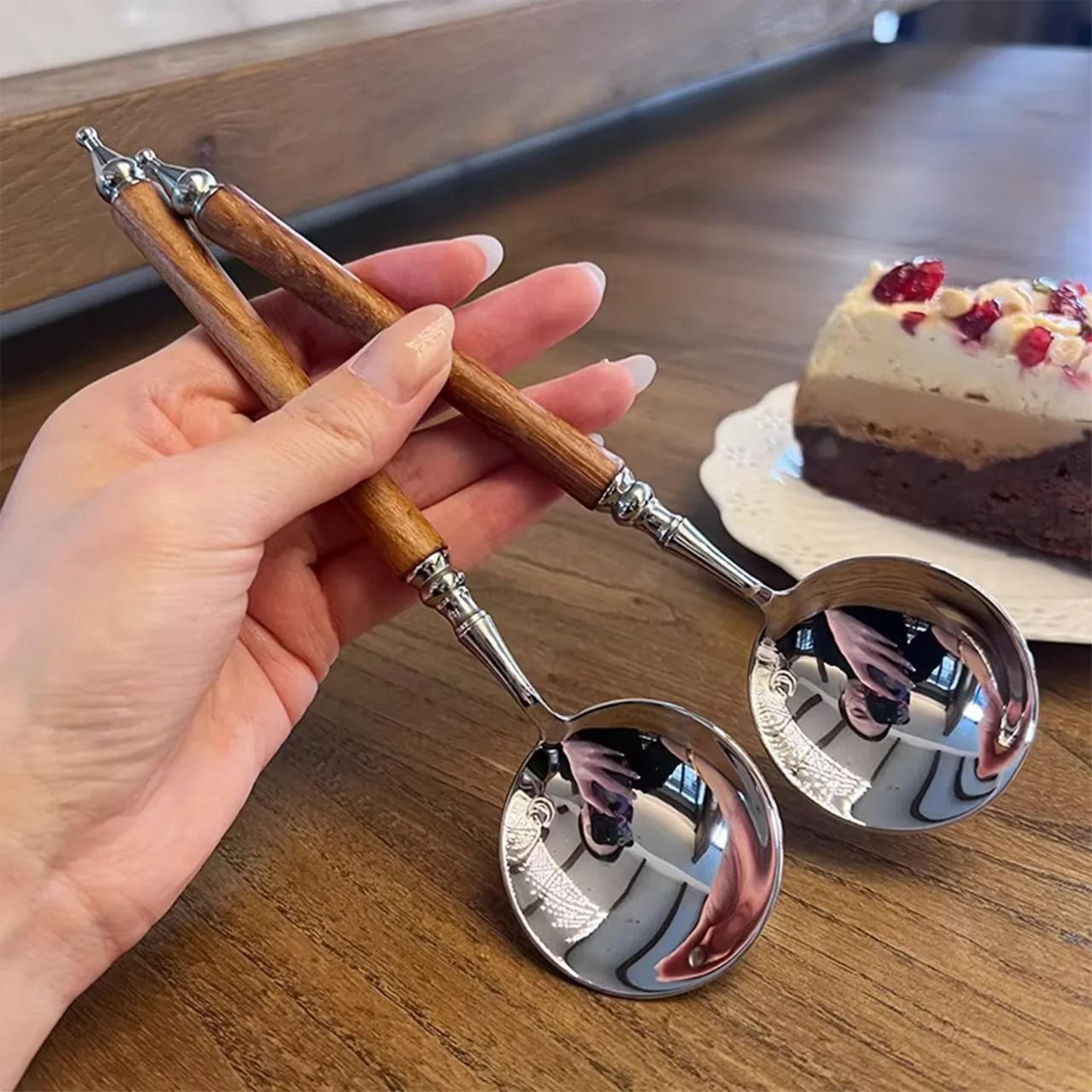 stainless steel spoon with wood-look handle for soup and dessert