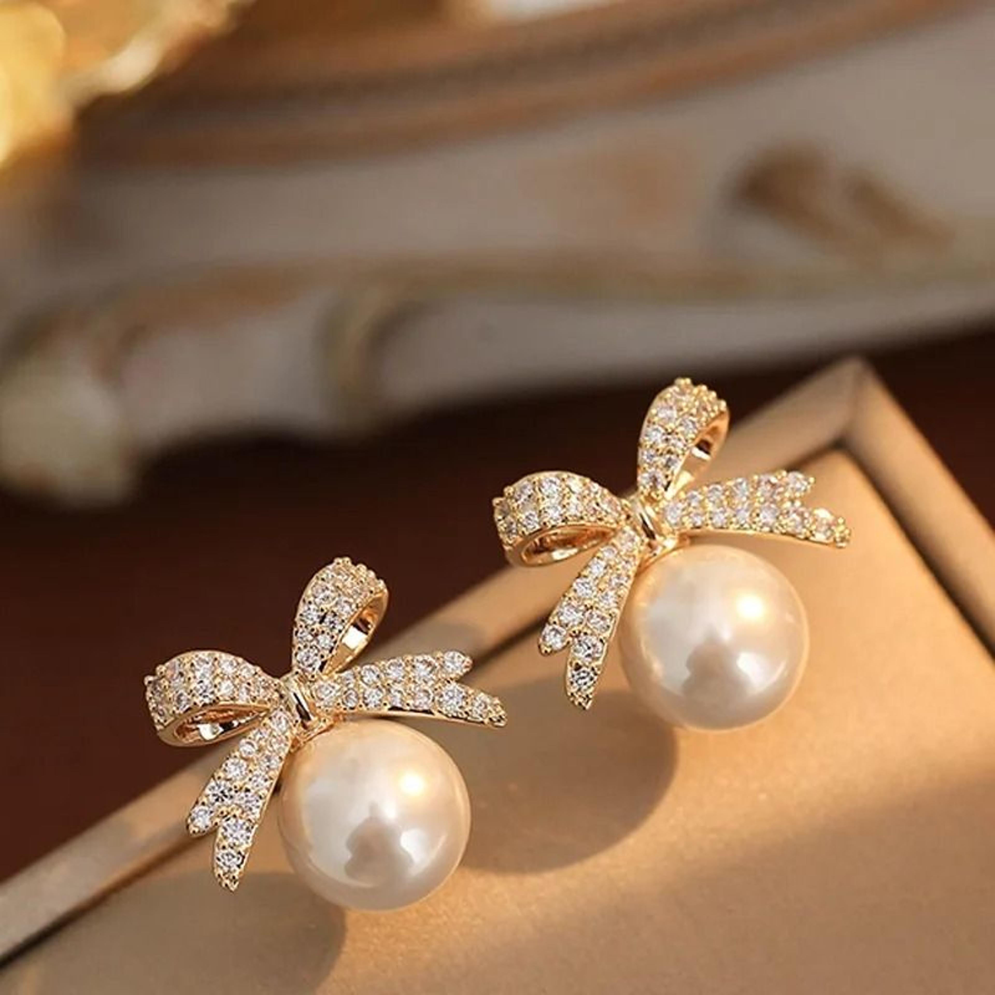 sparkling pearl bow stud earrings
