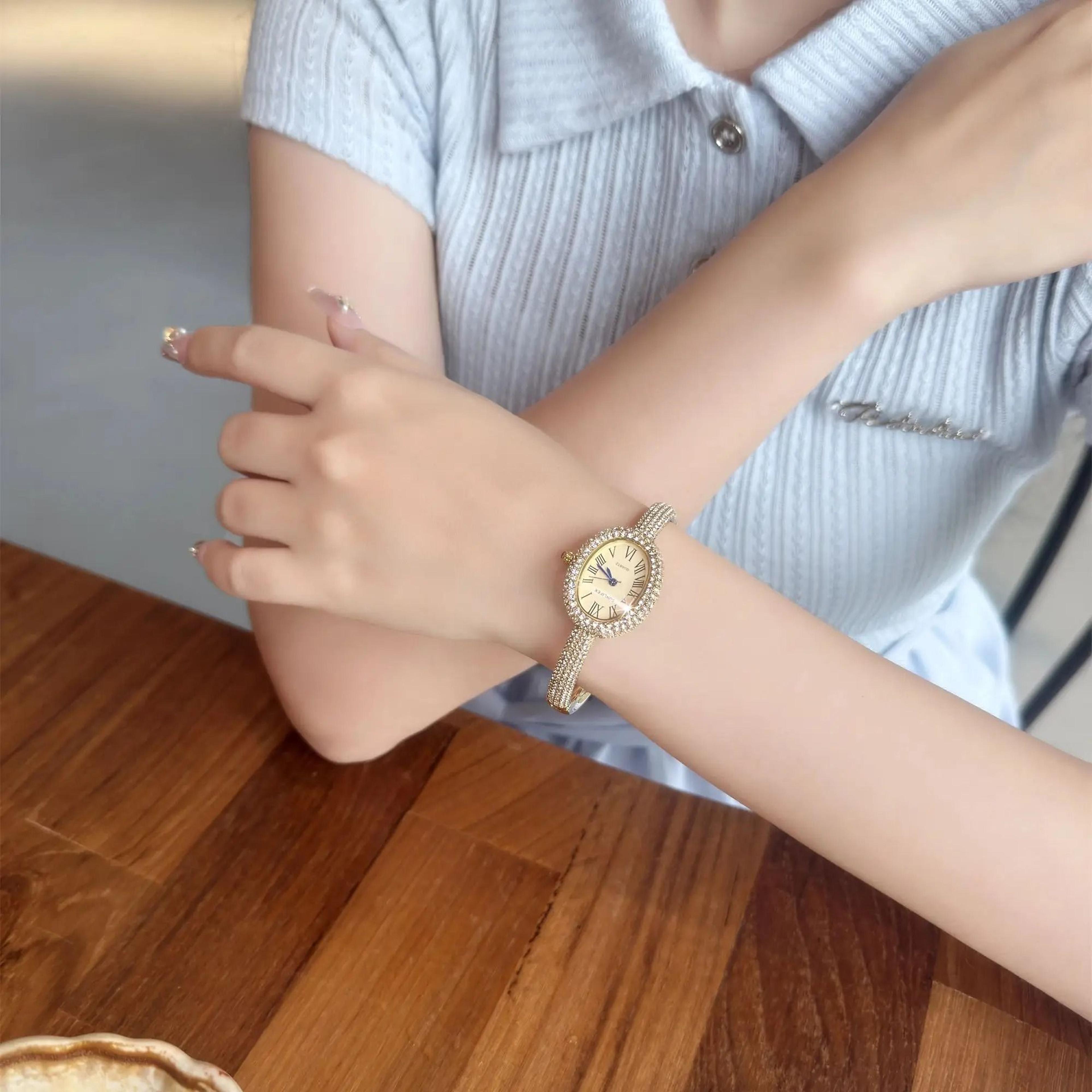 elegant roman numeral oval bracelet watch