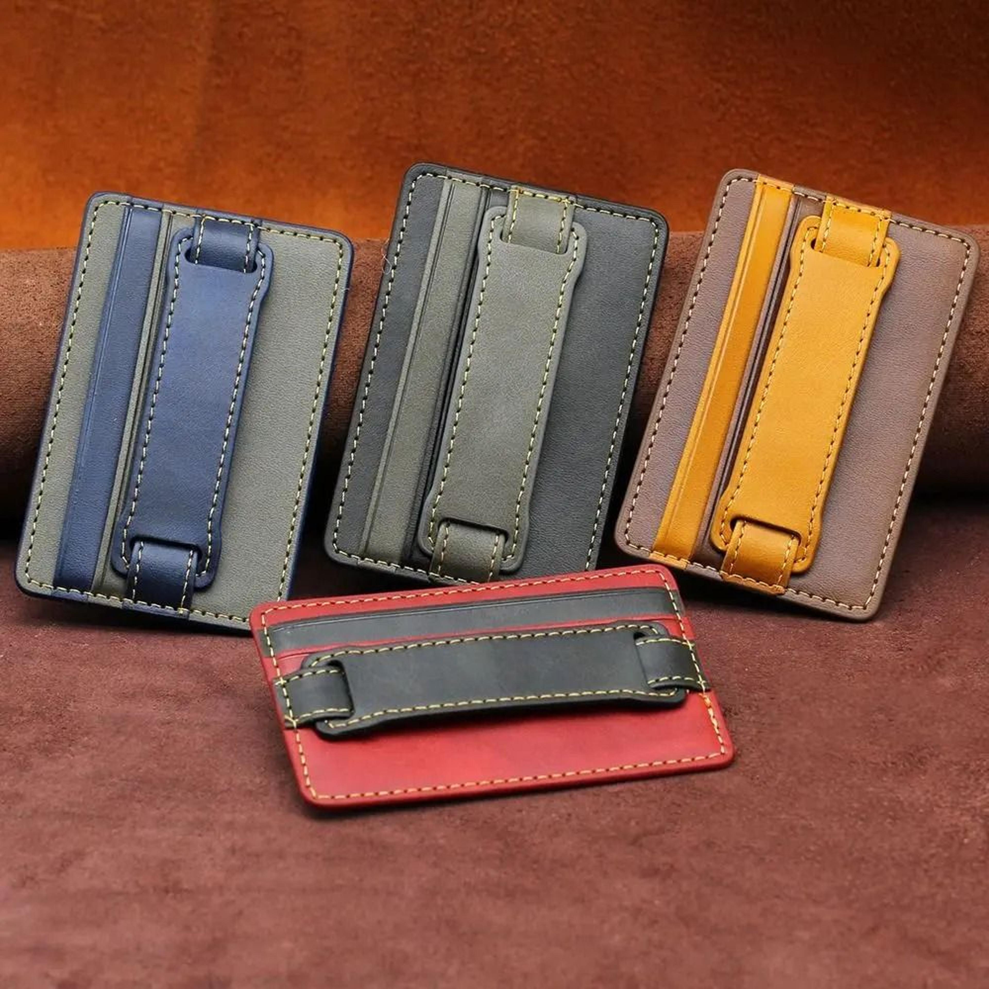 adhesive phone wallet with integrated grip strap