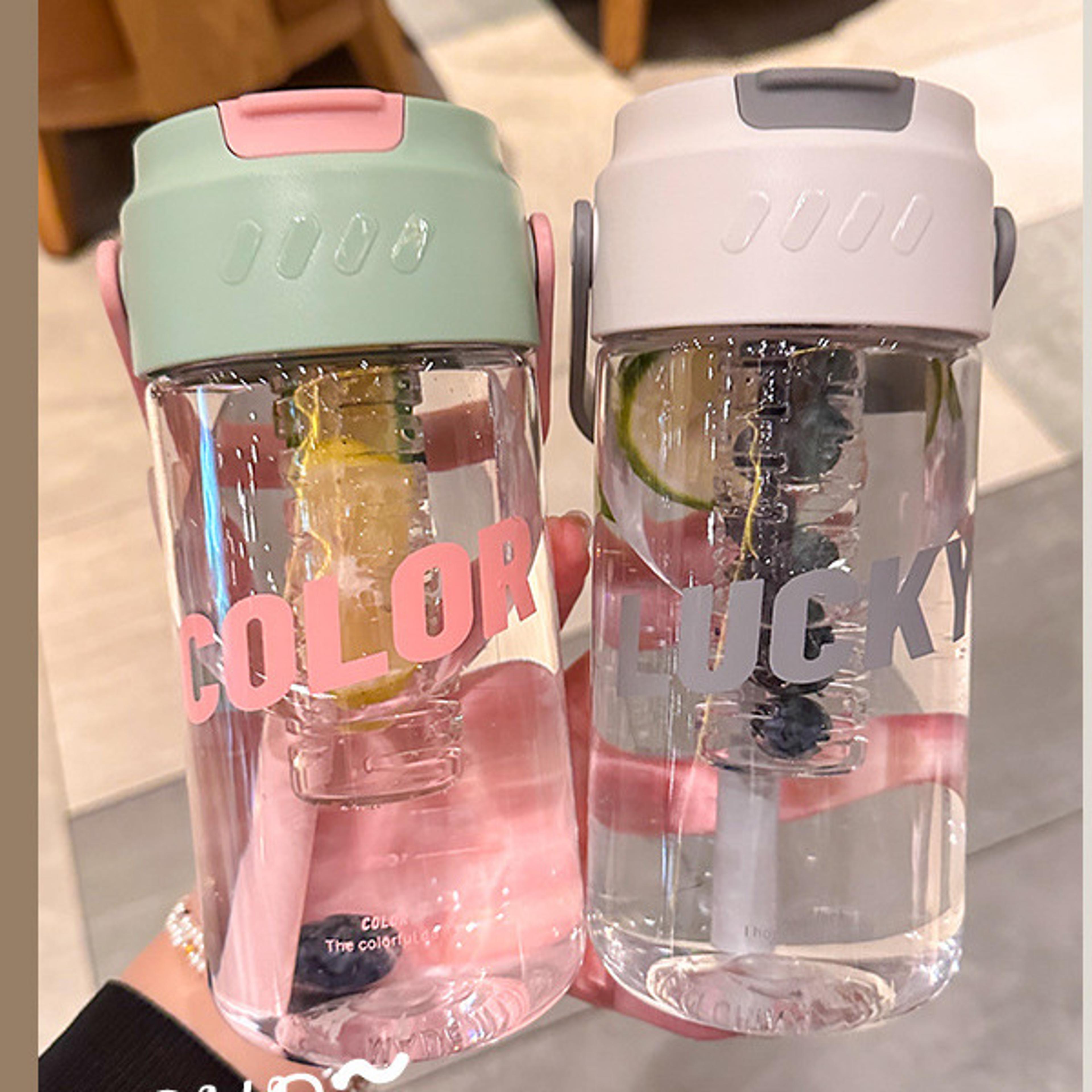 hydra go large capacity water bottle with straw and portable carry handle
