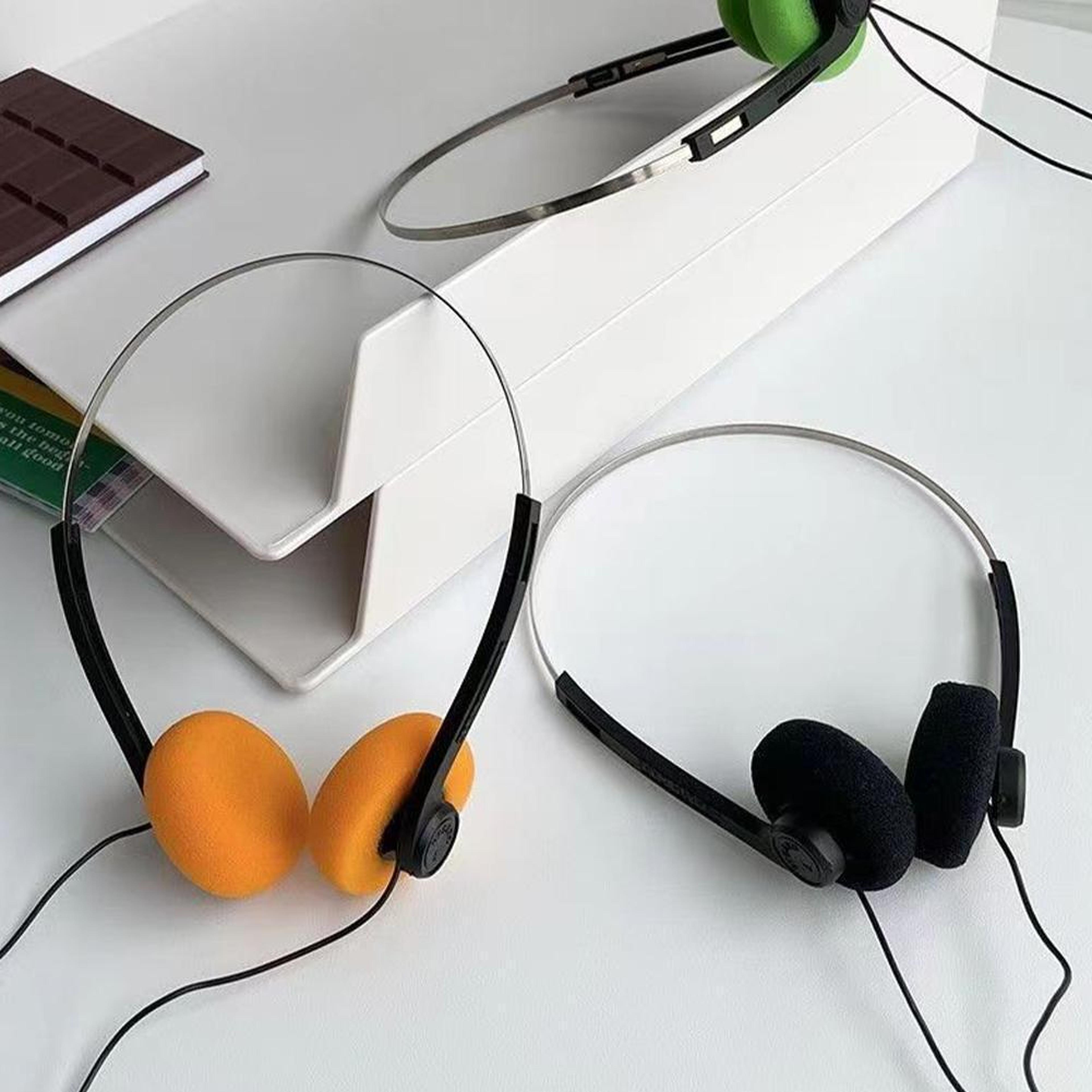 retro wired headphones with vintage walkman style over ear design
