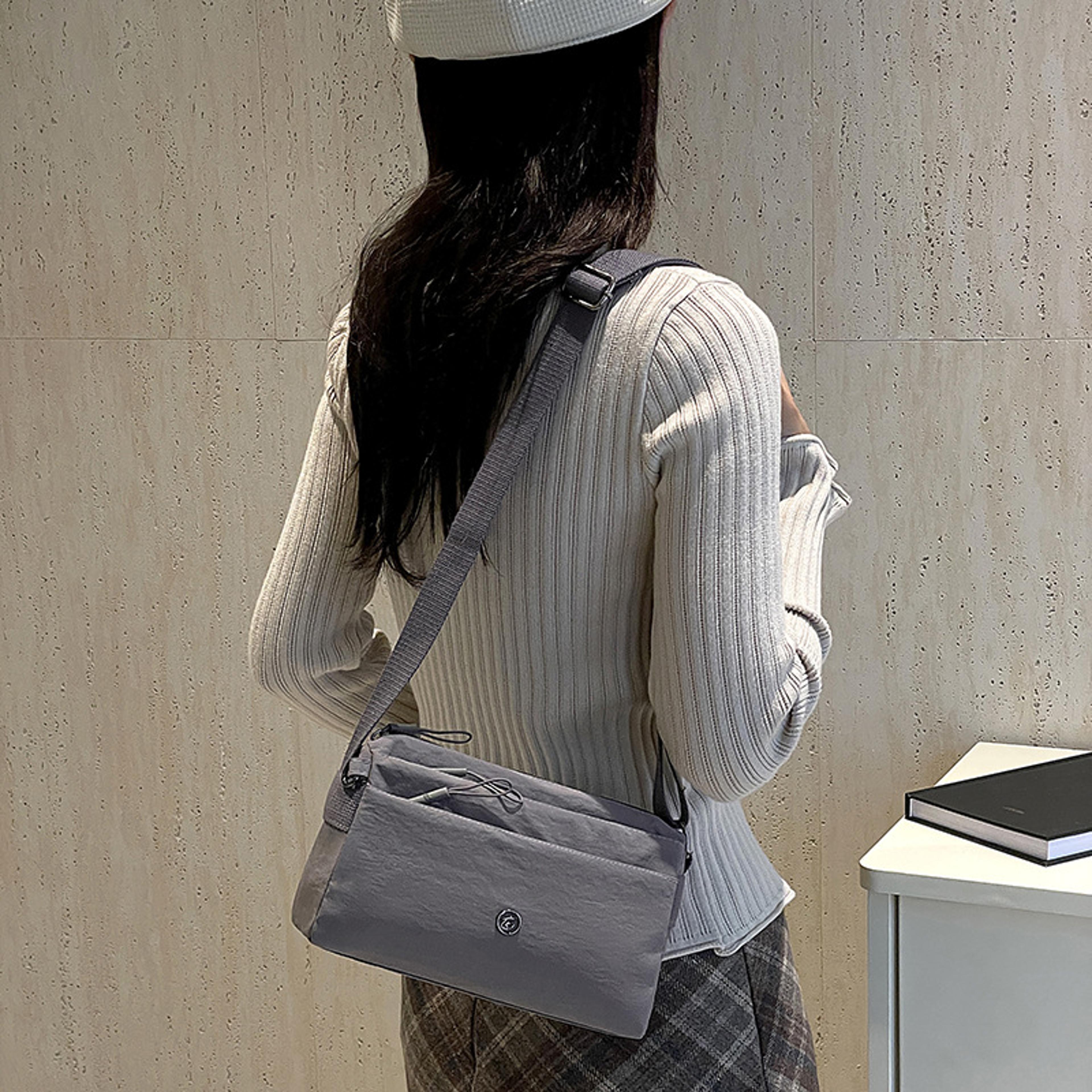 lightweight nylon crossbody bag with four layer zipper pockets for women