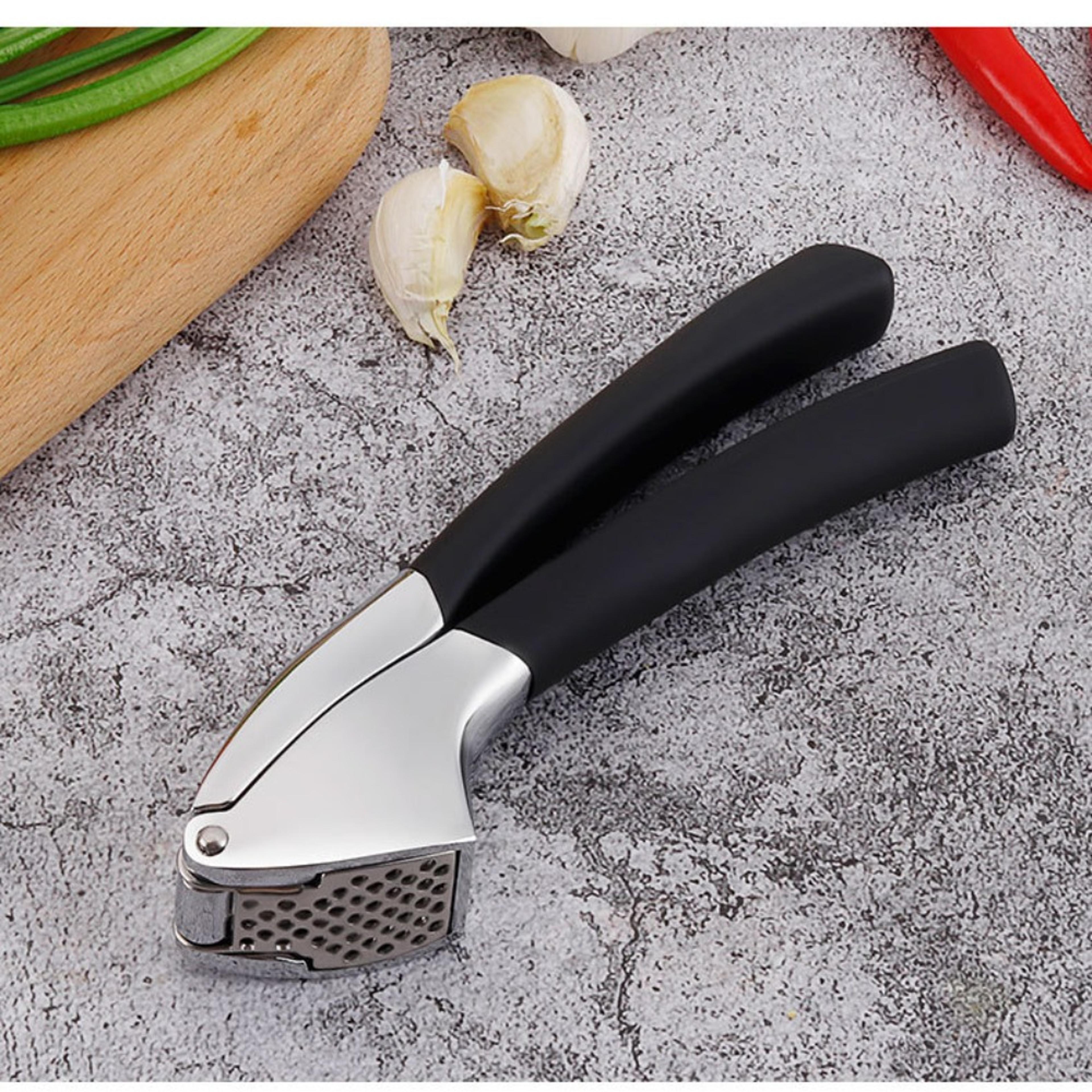 stainless steel garlic press handheld crusher with ergonomic non slip grip