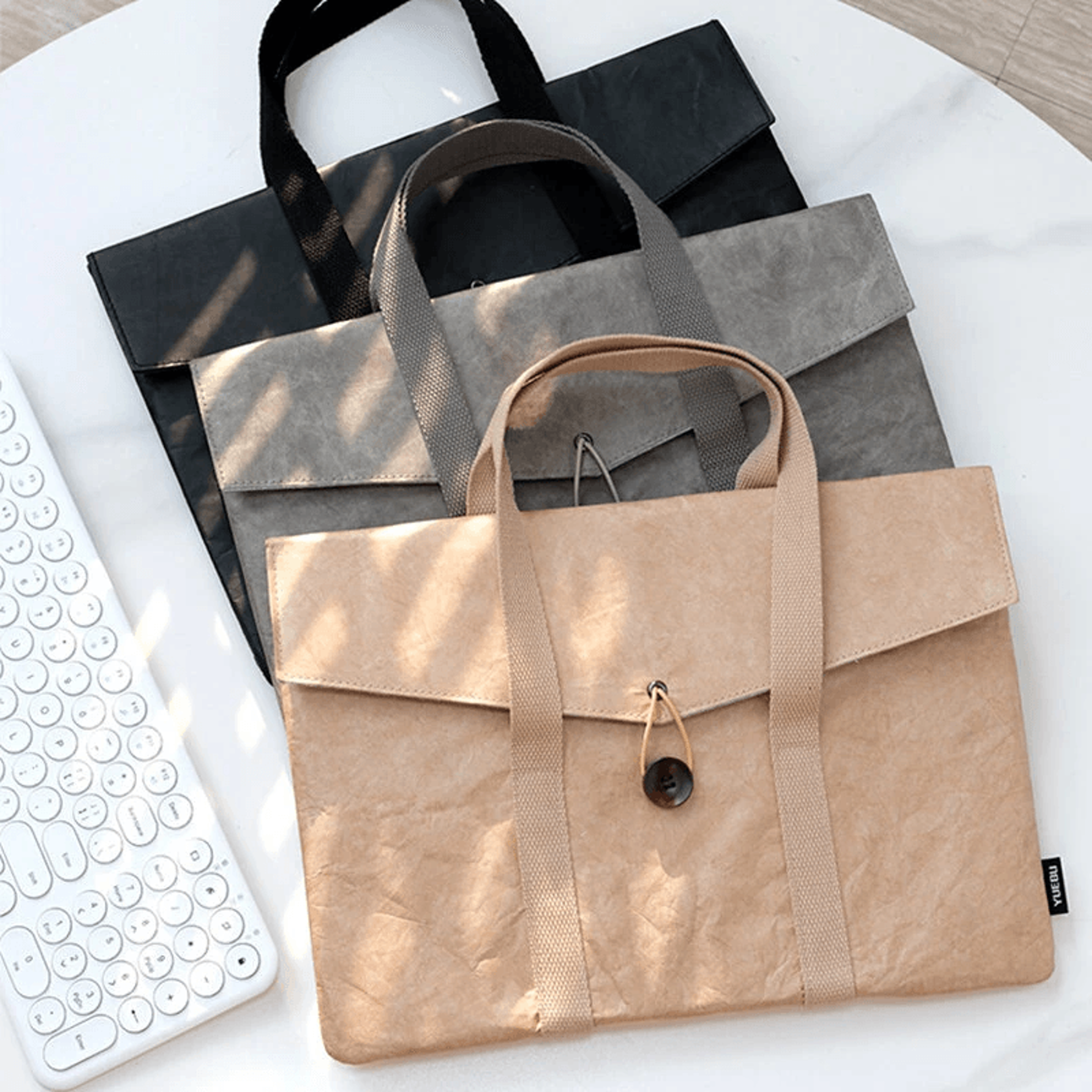 ultra lightweight waterproof laptop sleeve with felt lining and carry handles