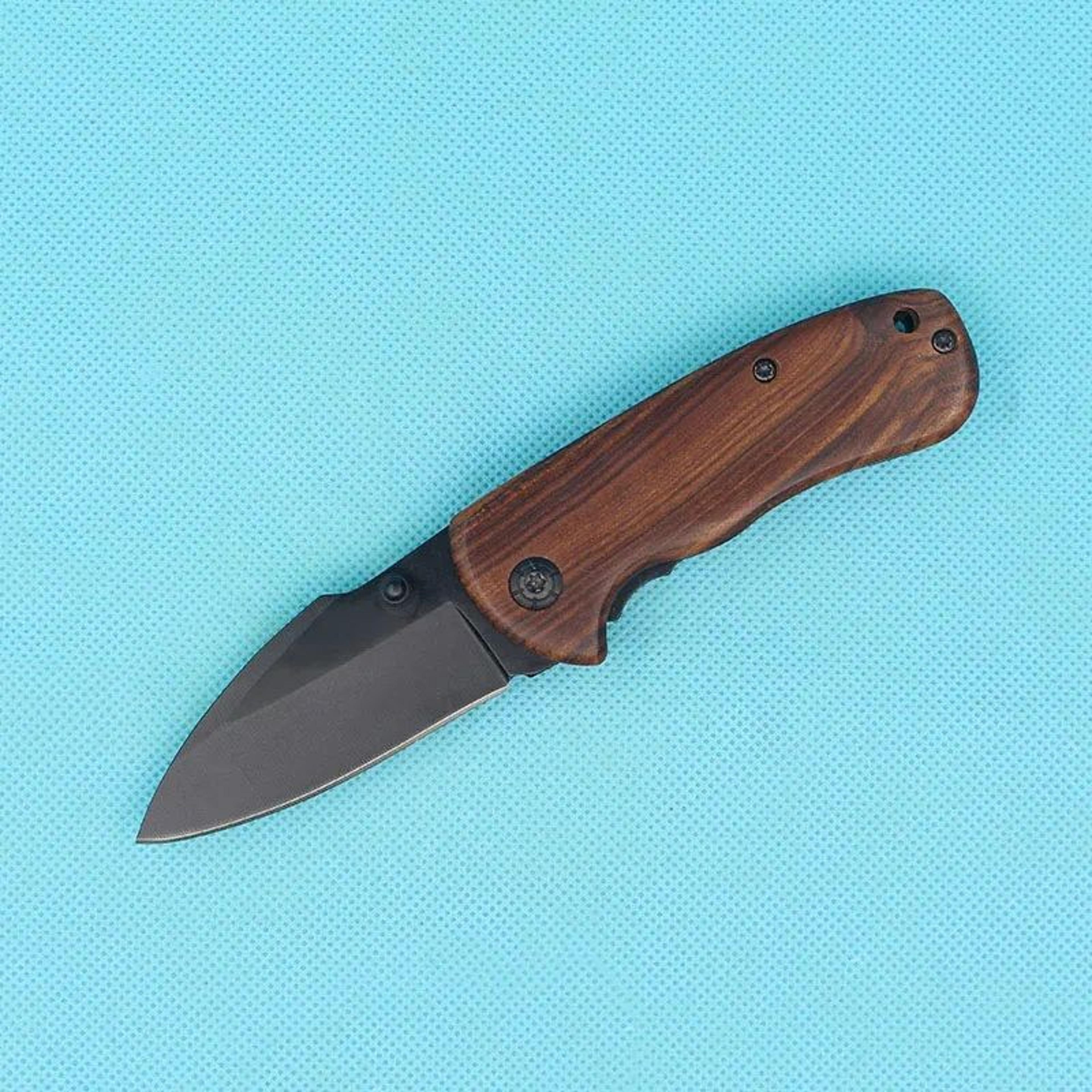 folding pocket knife with stainless steel blade and wood handle