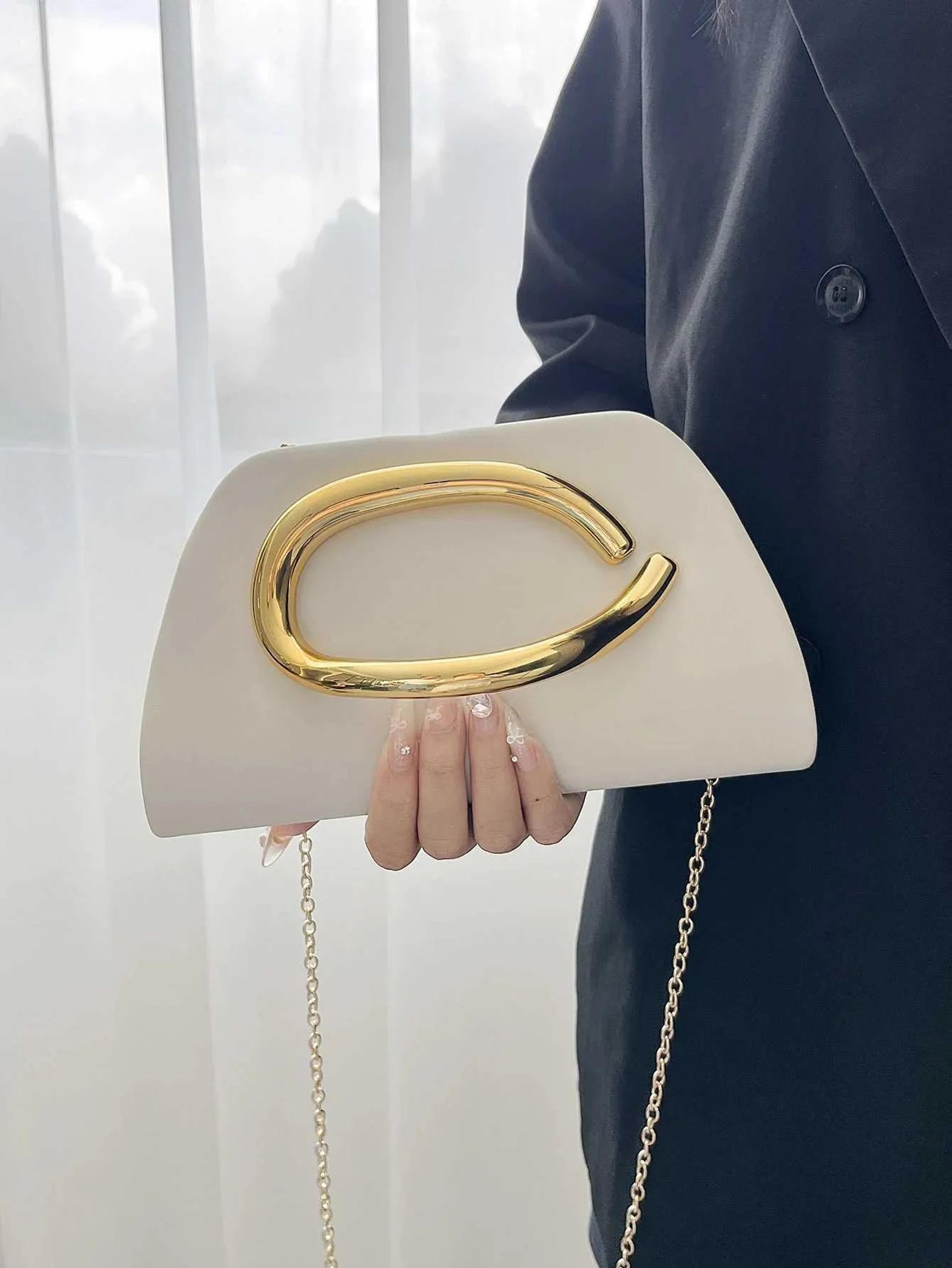 women's gold evening bag with magnetic closure and chain crossbody strap