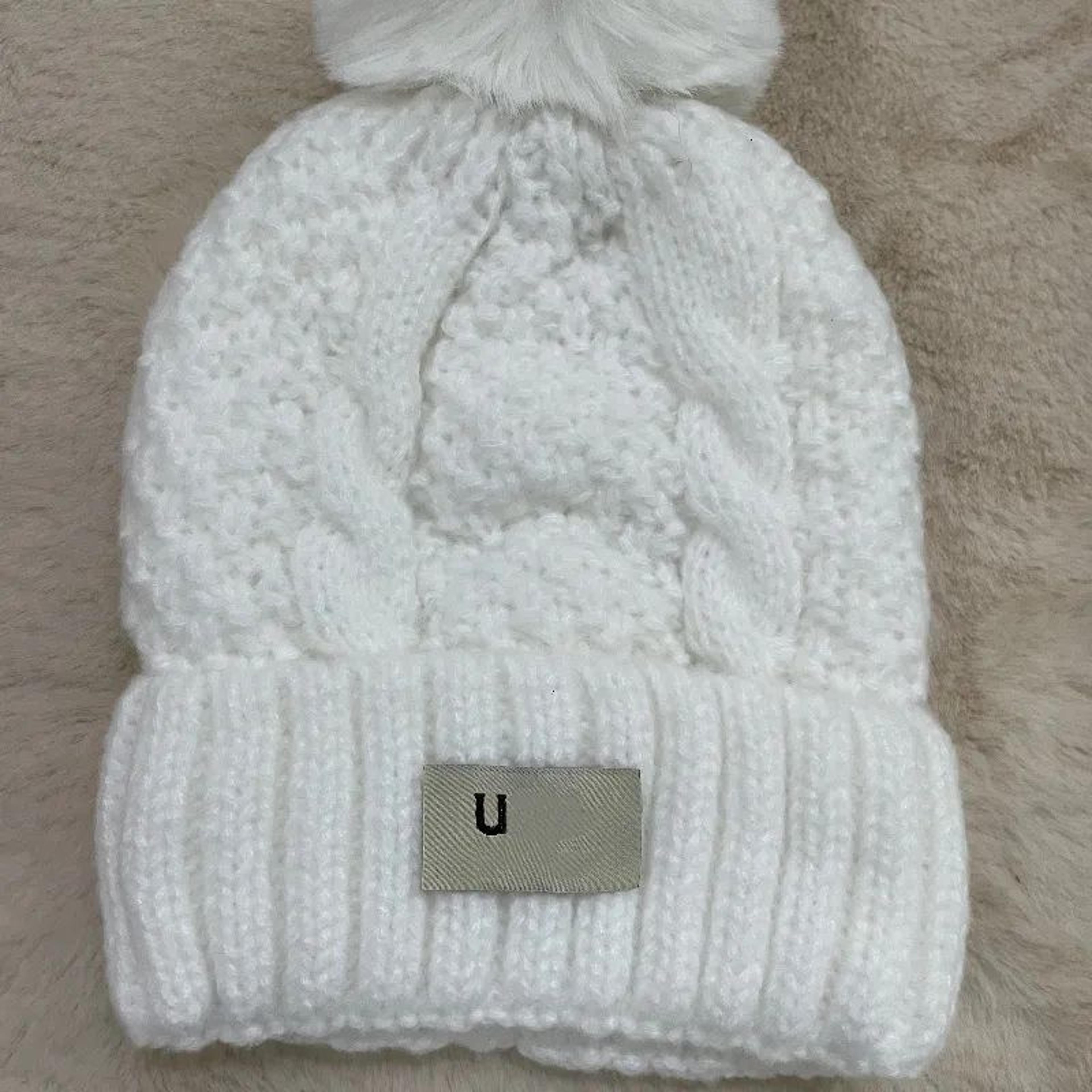 unisex cashmere wool knit beanie hat with bobble for warm winter wear