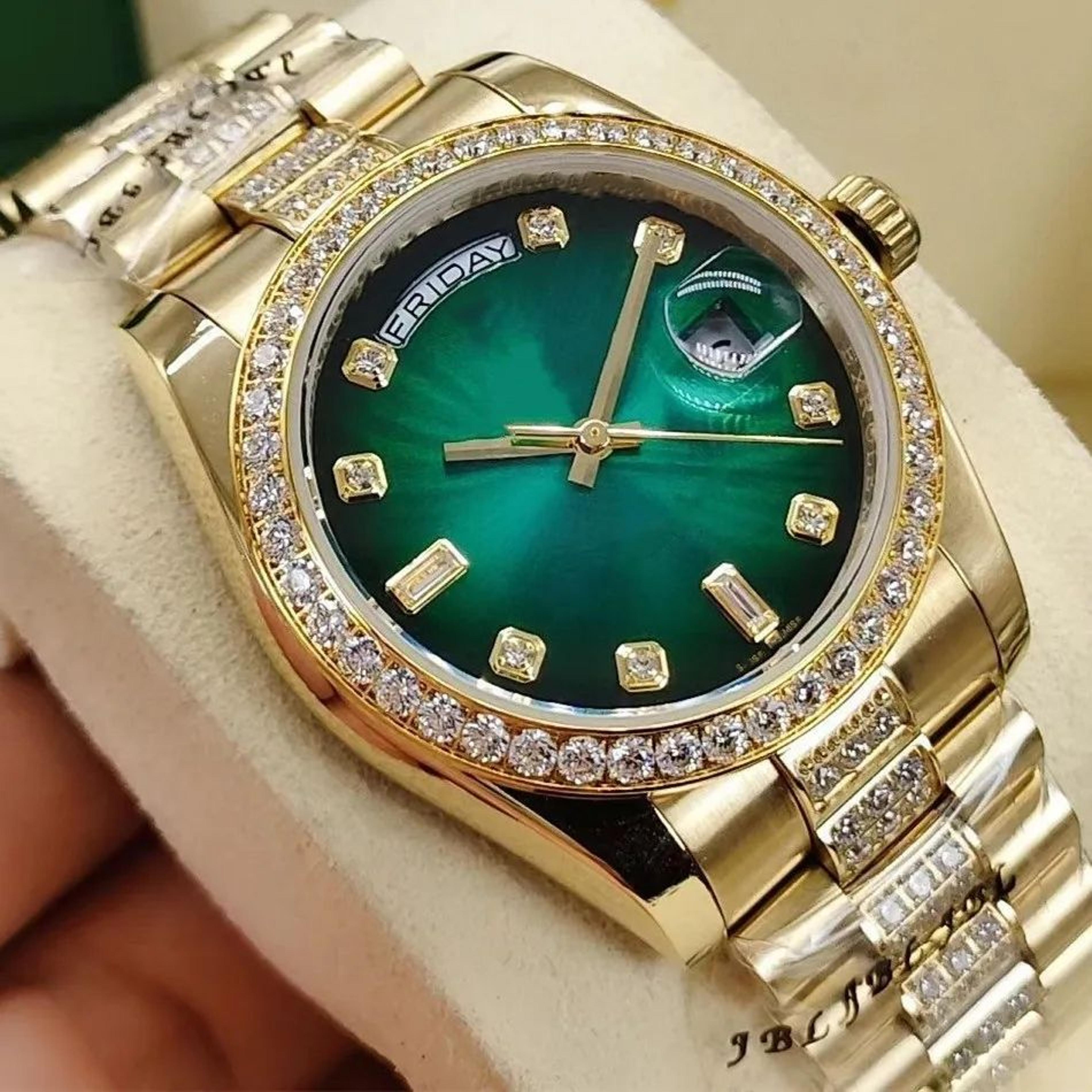 men's vintage automatic mechanical watch with green dial and gold toned stainless steel band
