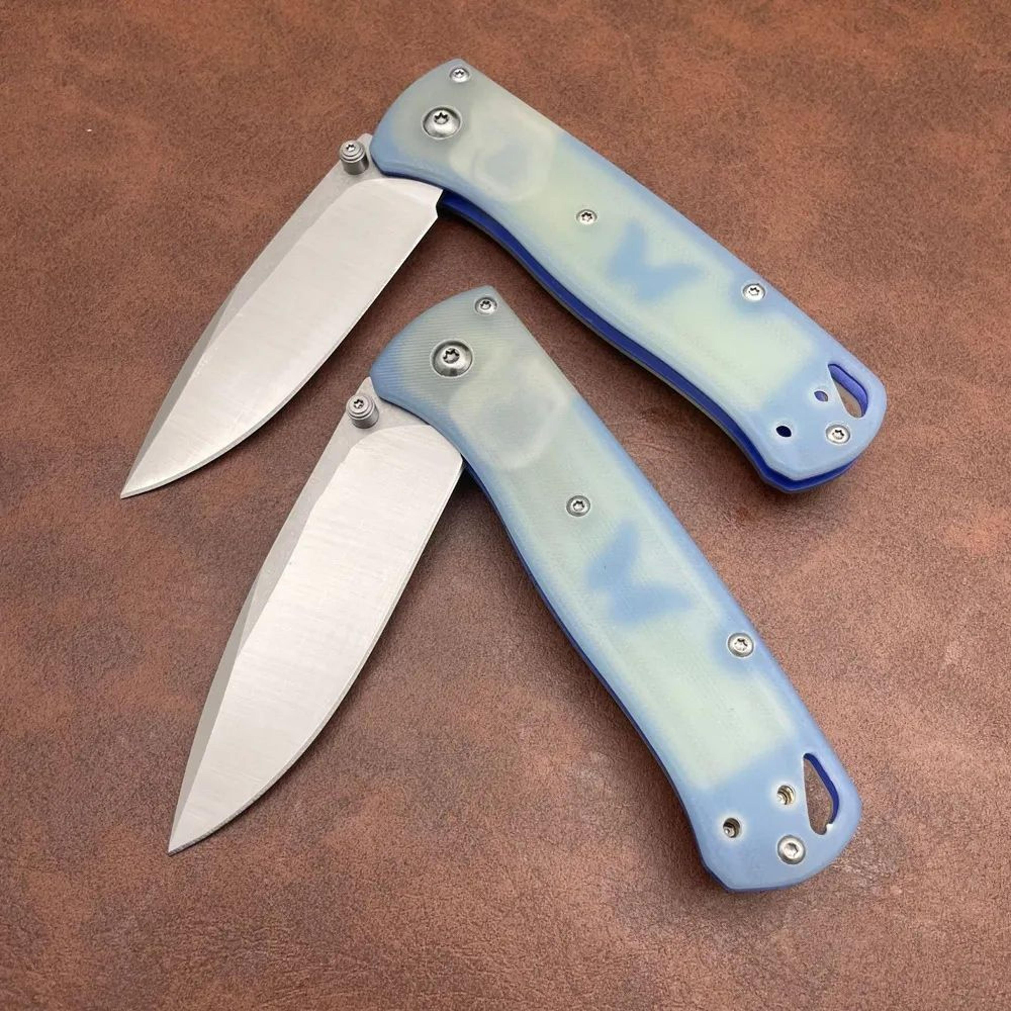 pocket folding knife with drop point blade and jade handle