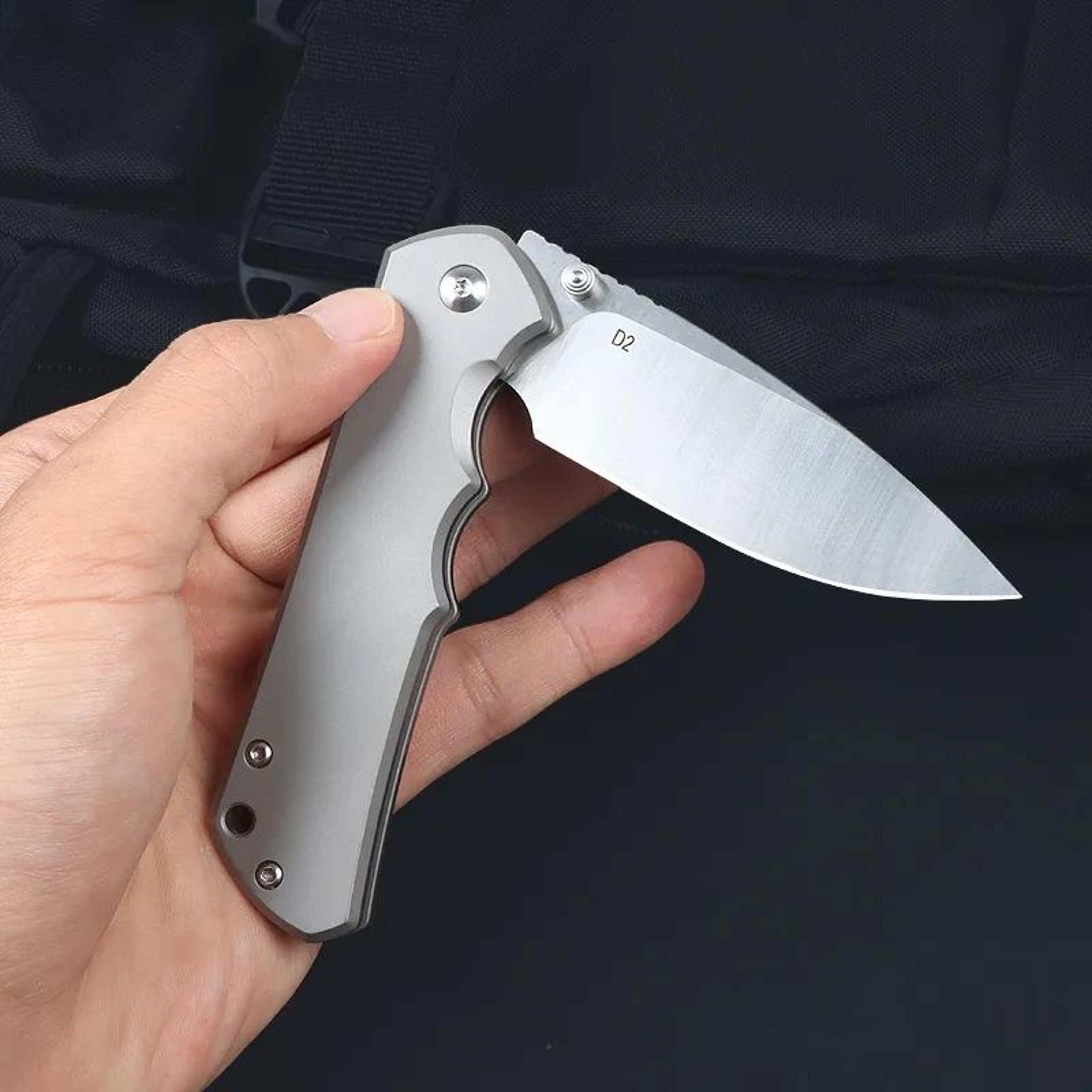 folding pocket knife with satin blade and titanium alloy handle