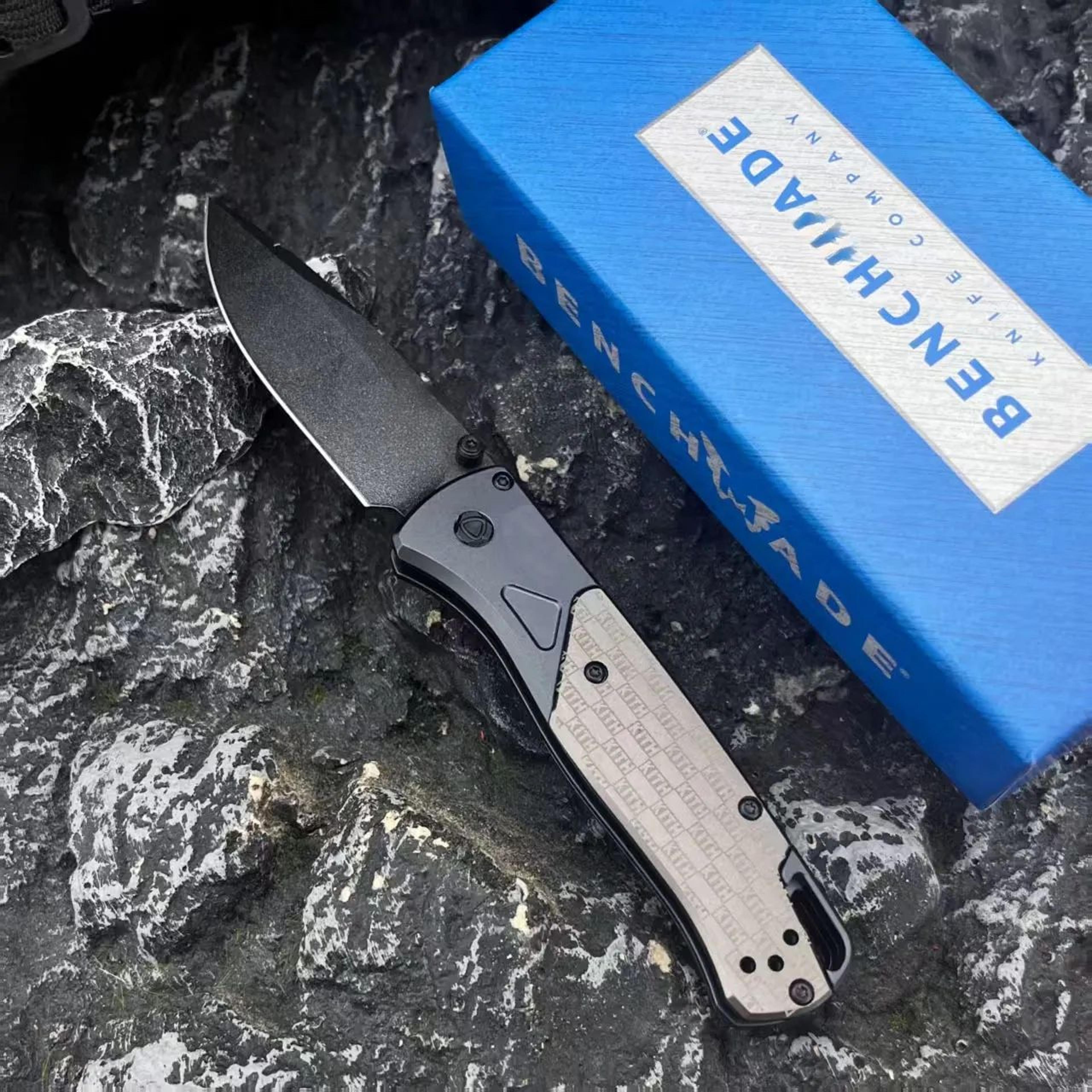 folding camping knife with serrated steel blade and aluminum handle