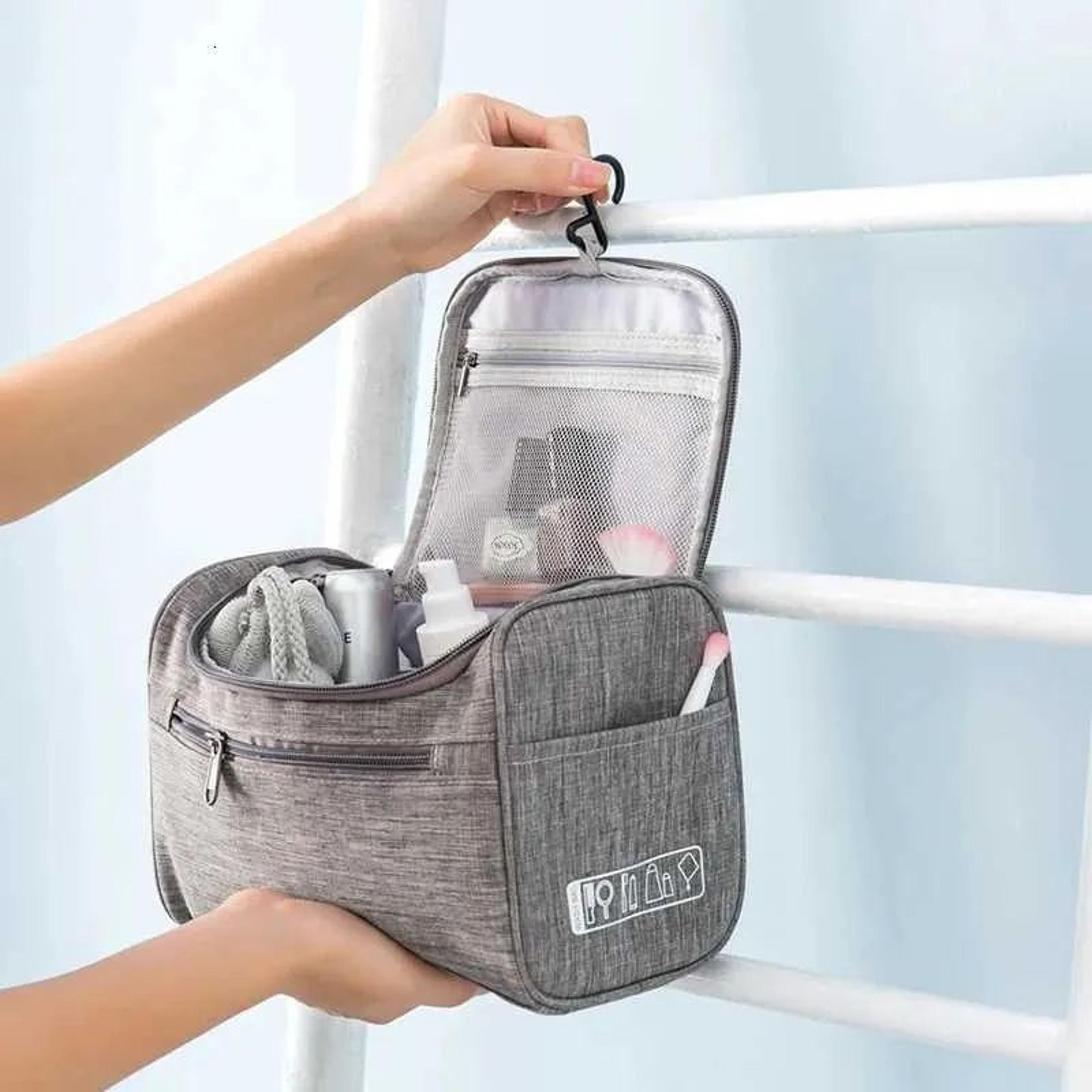 portable hanging toiletry bag with zippered compartments for travel and makeup storage