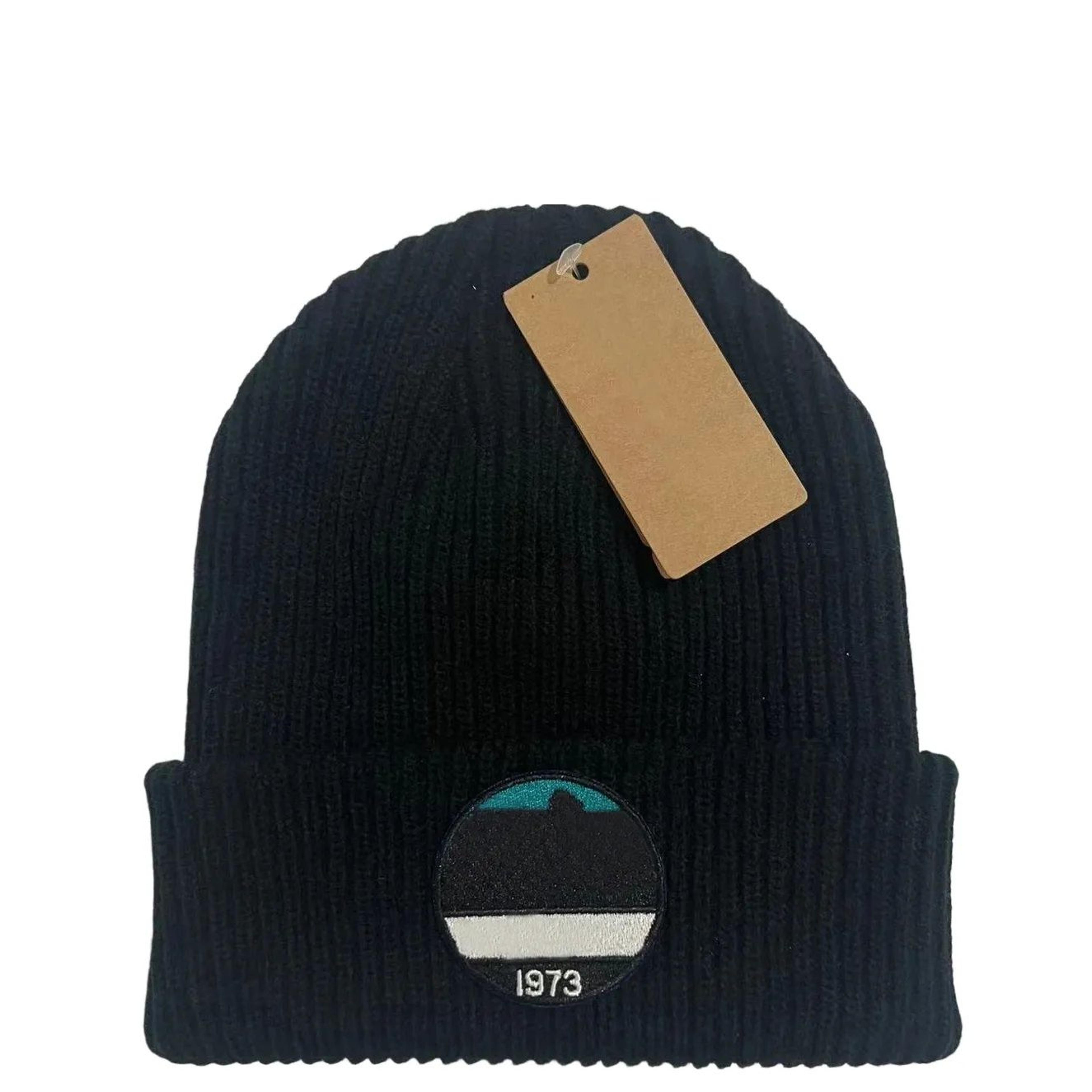 ribbed knit beanie hat with cuffed design and mountain peak patch for men and women