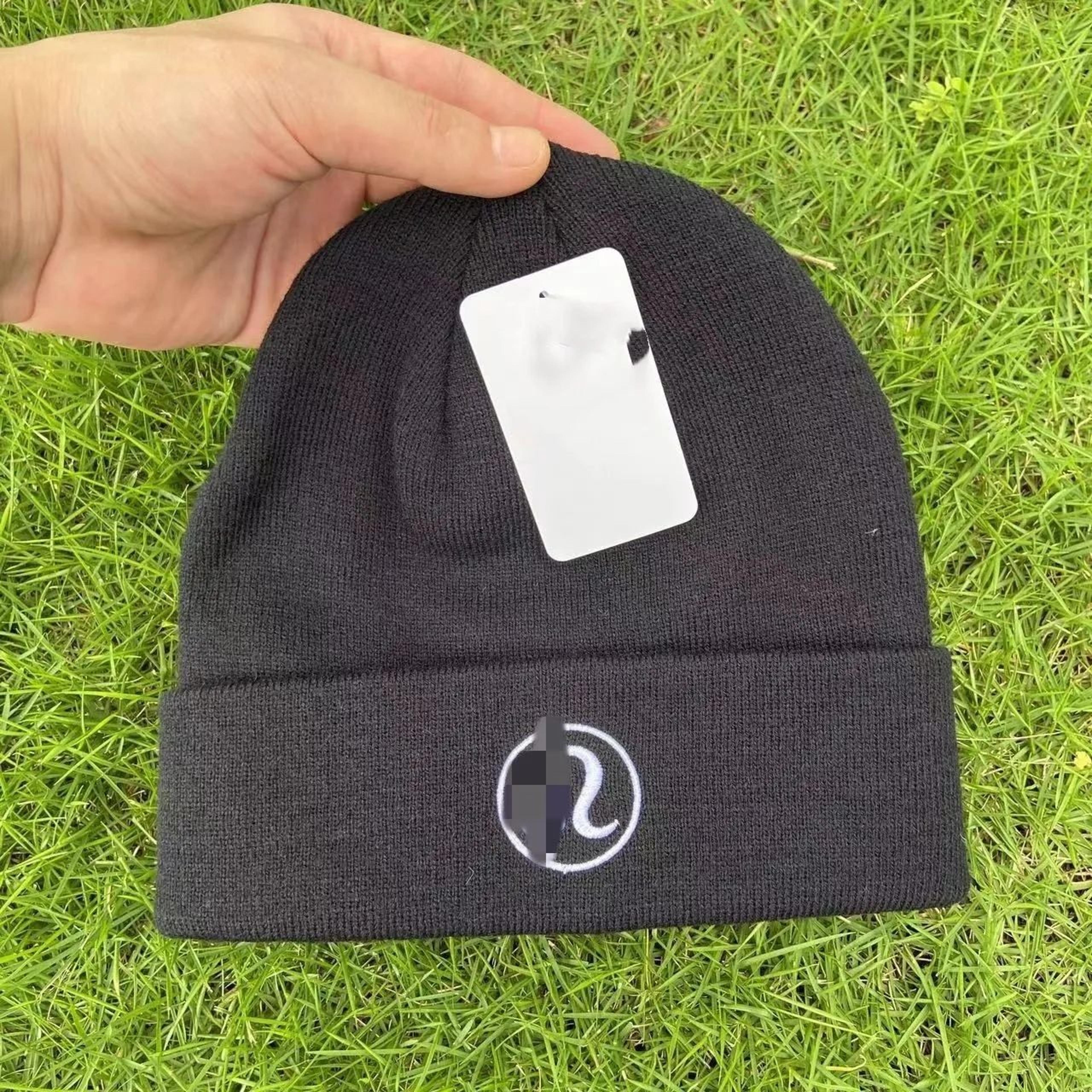unisex acrylic knit beanie hat with embroidered geometric design for fall and winter