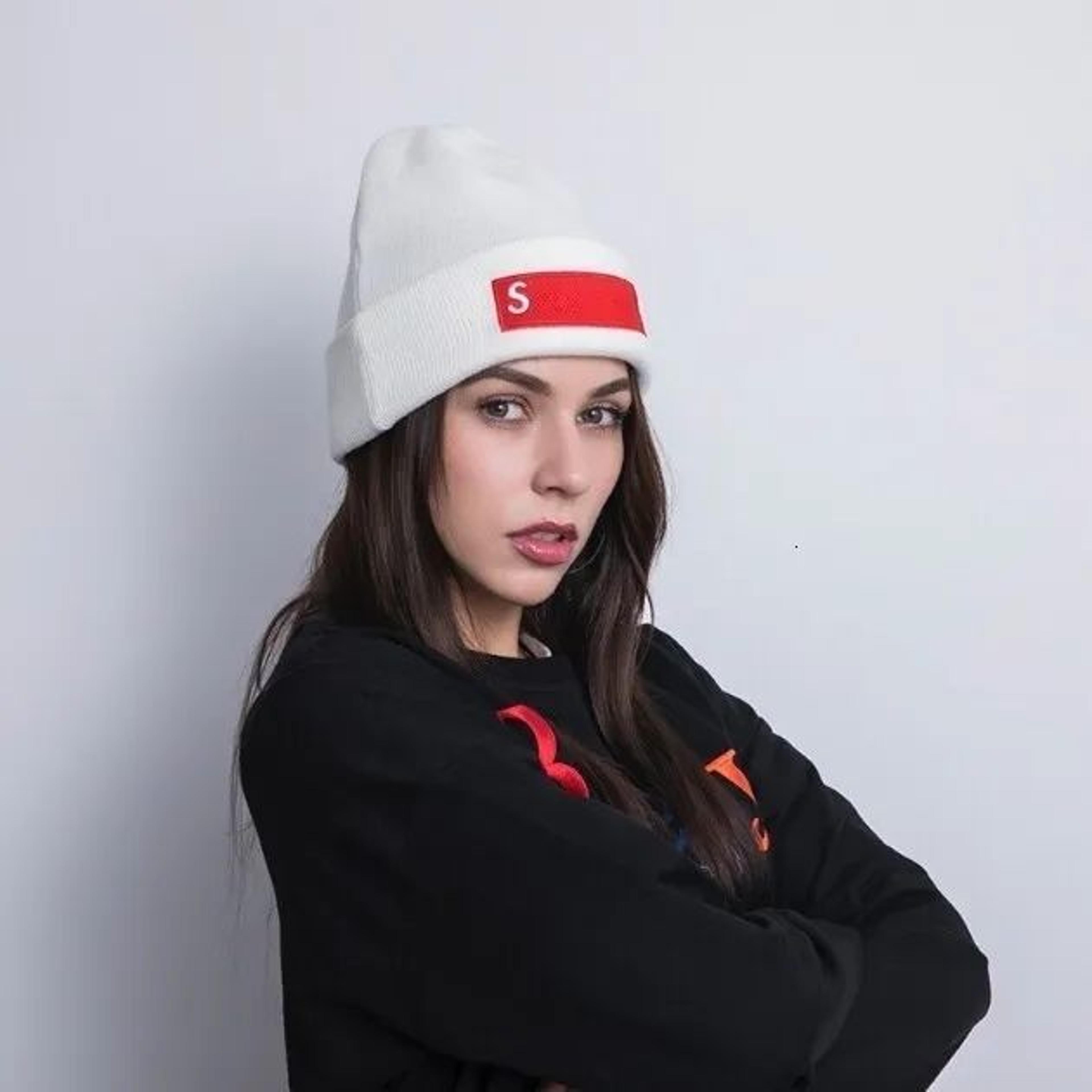 men's winter beanie hat with logo detail and casual streetwear style