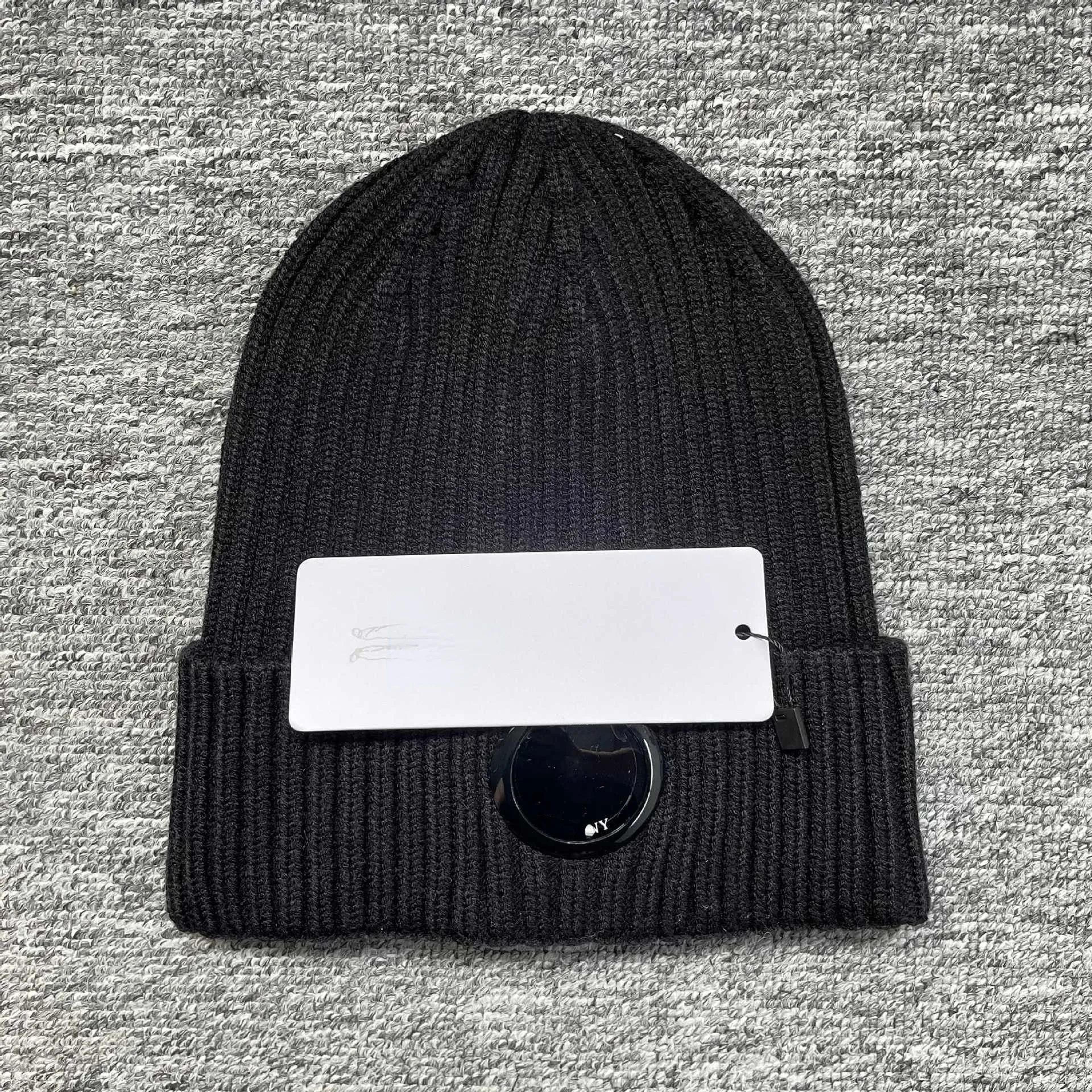 unisex thick knit winter beanie hat with single lens detail for warmth