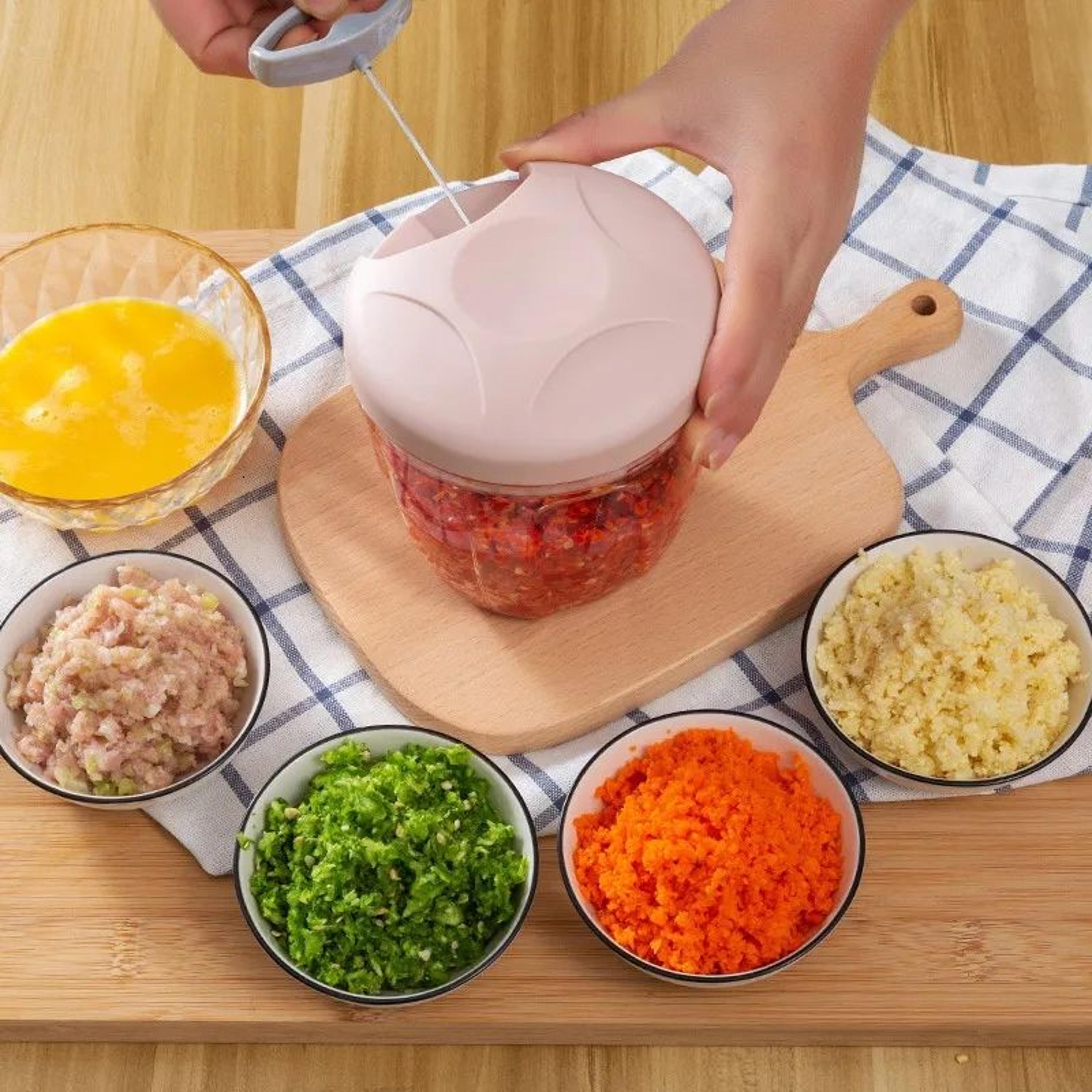 manual fruit and vegetable chopper with stainless steel blades and pull cord