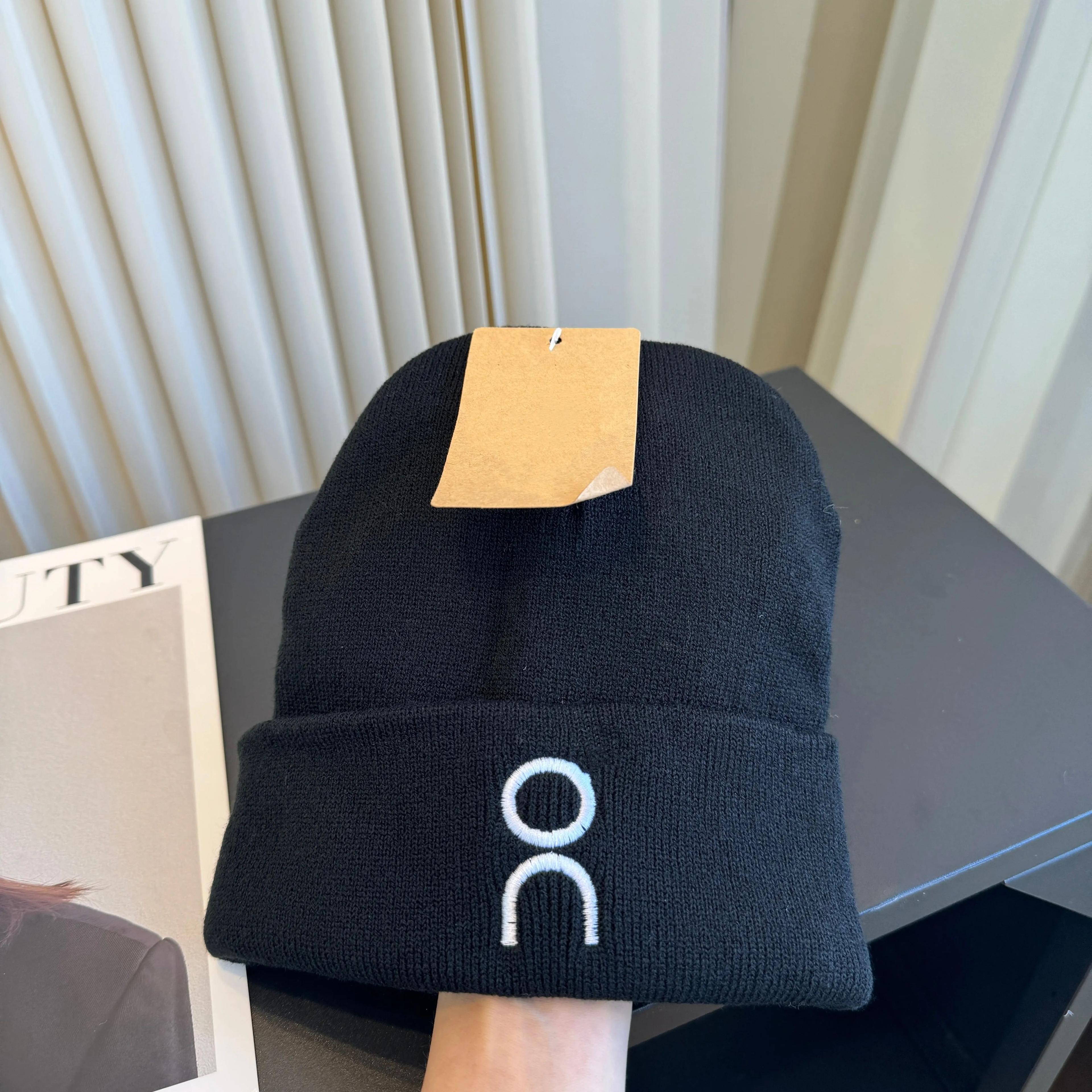 unisex cuffed knit beanie hat with white embroidery for winter outdoor wear