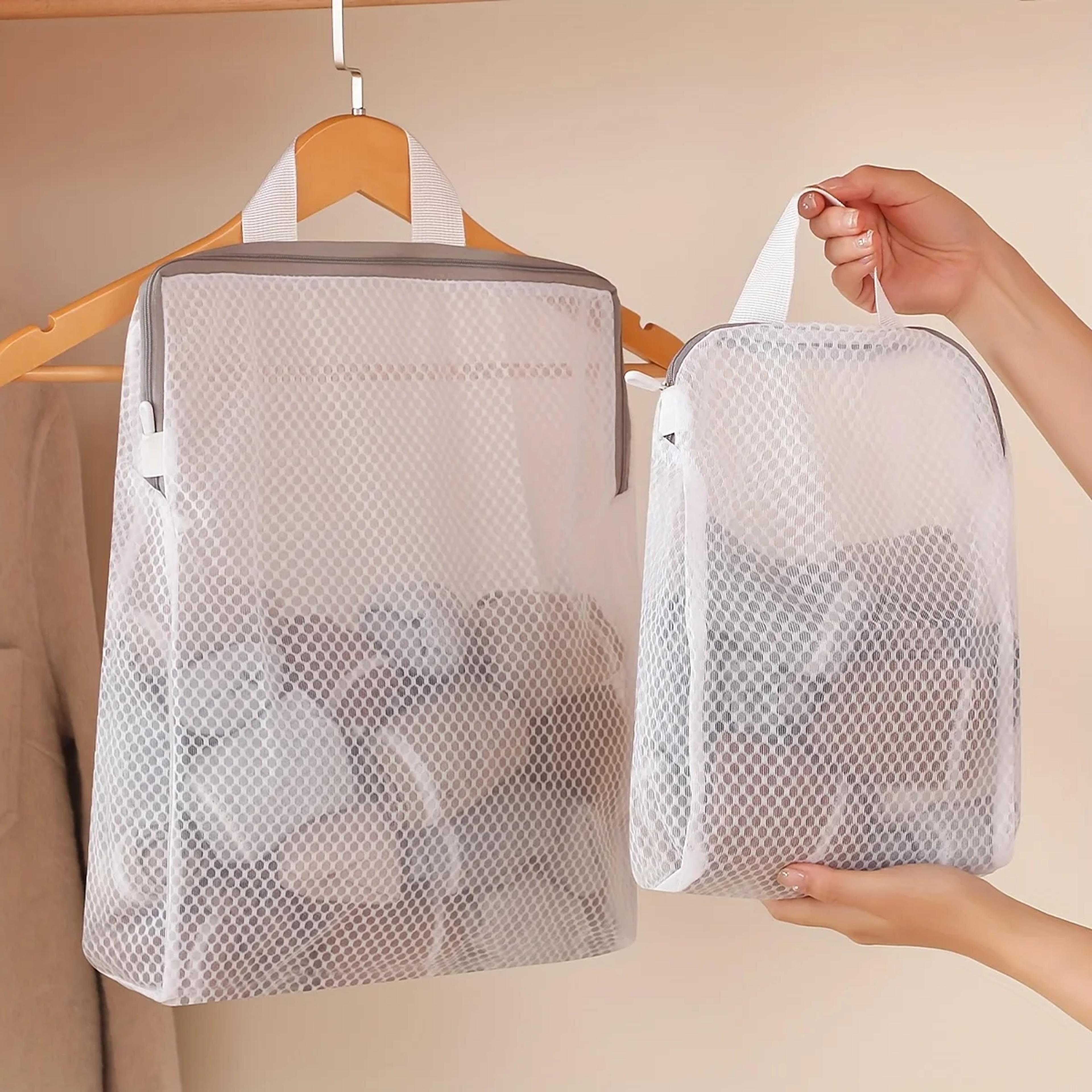 wall mounted laundry bag honeycomb mesh organizer with zipper for clothes storage