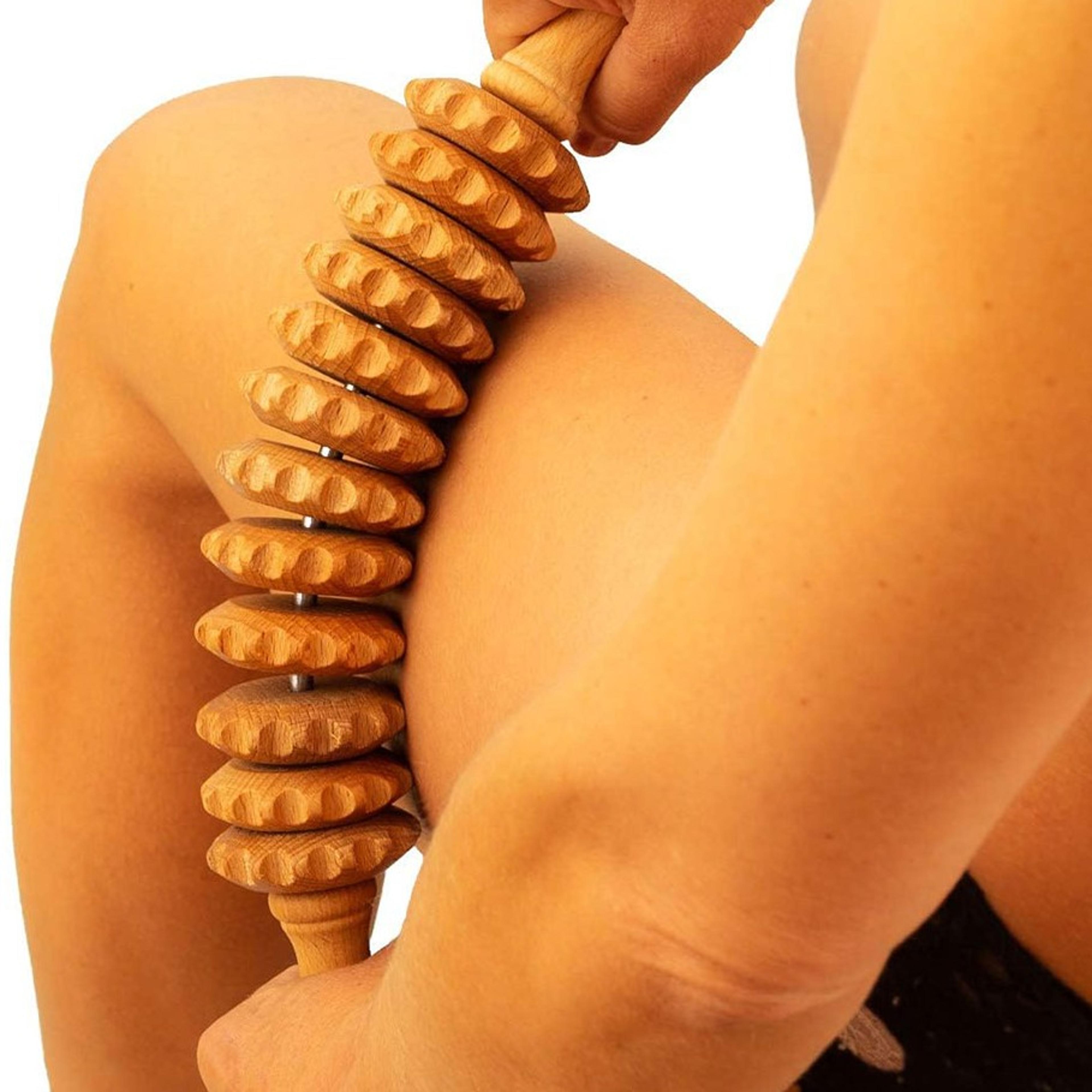 natural curved wooden massage roller for cellulite massage and muscle relief