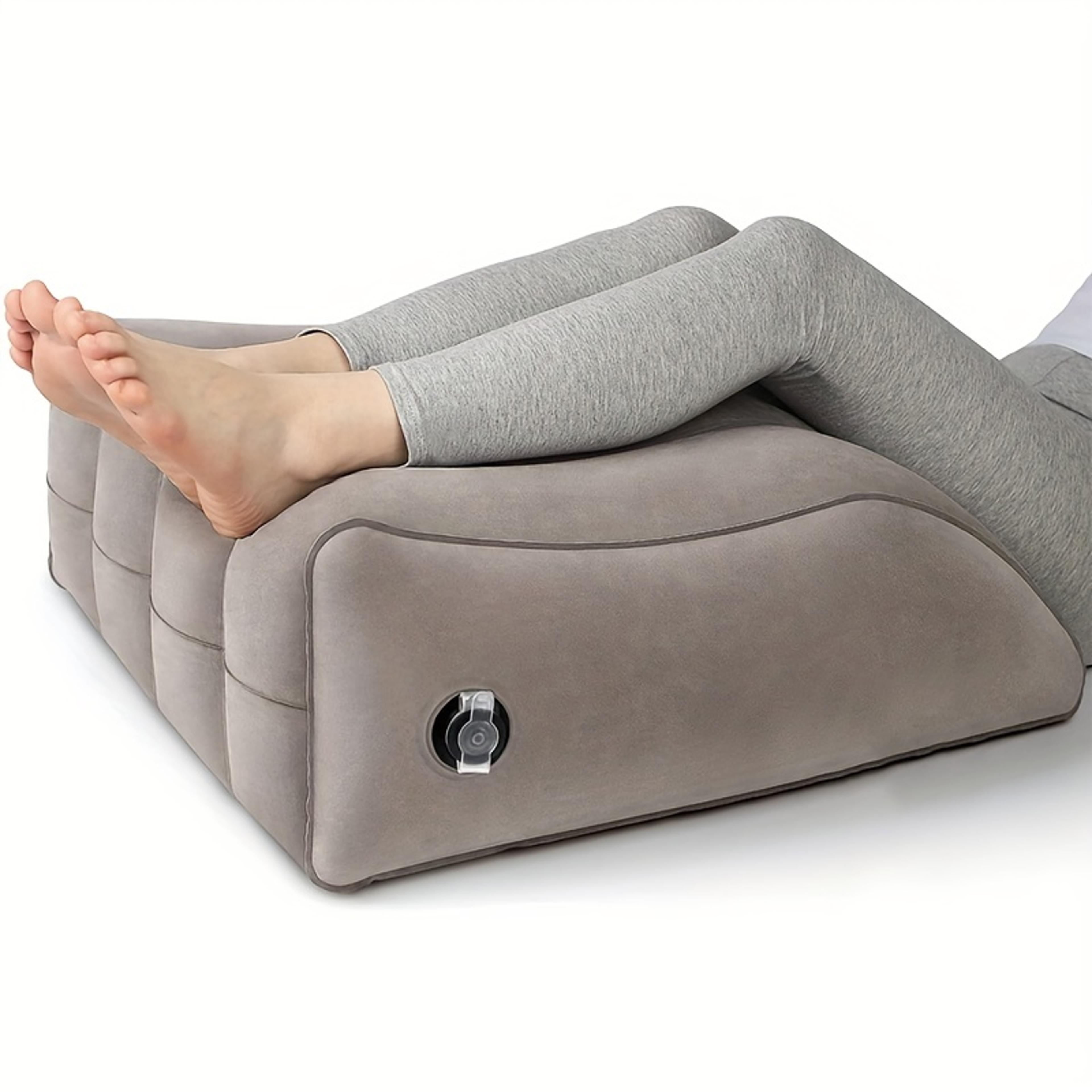 inflatable leg elevation pillow with wedge knee support for rest and recovery