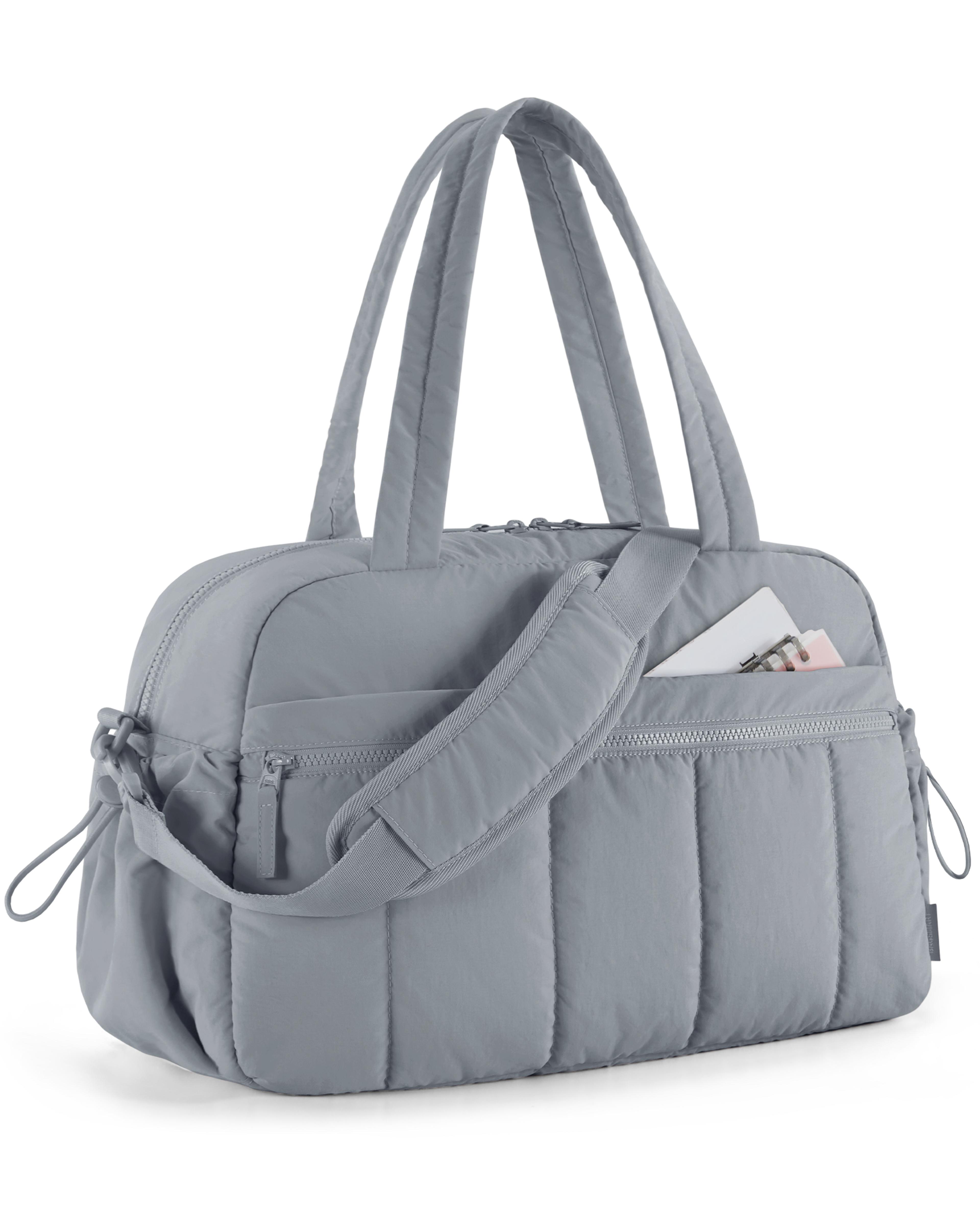 elite travel duffel bag with wet pocket | waterproof weekender bag for women carry on