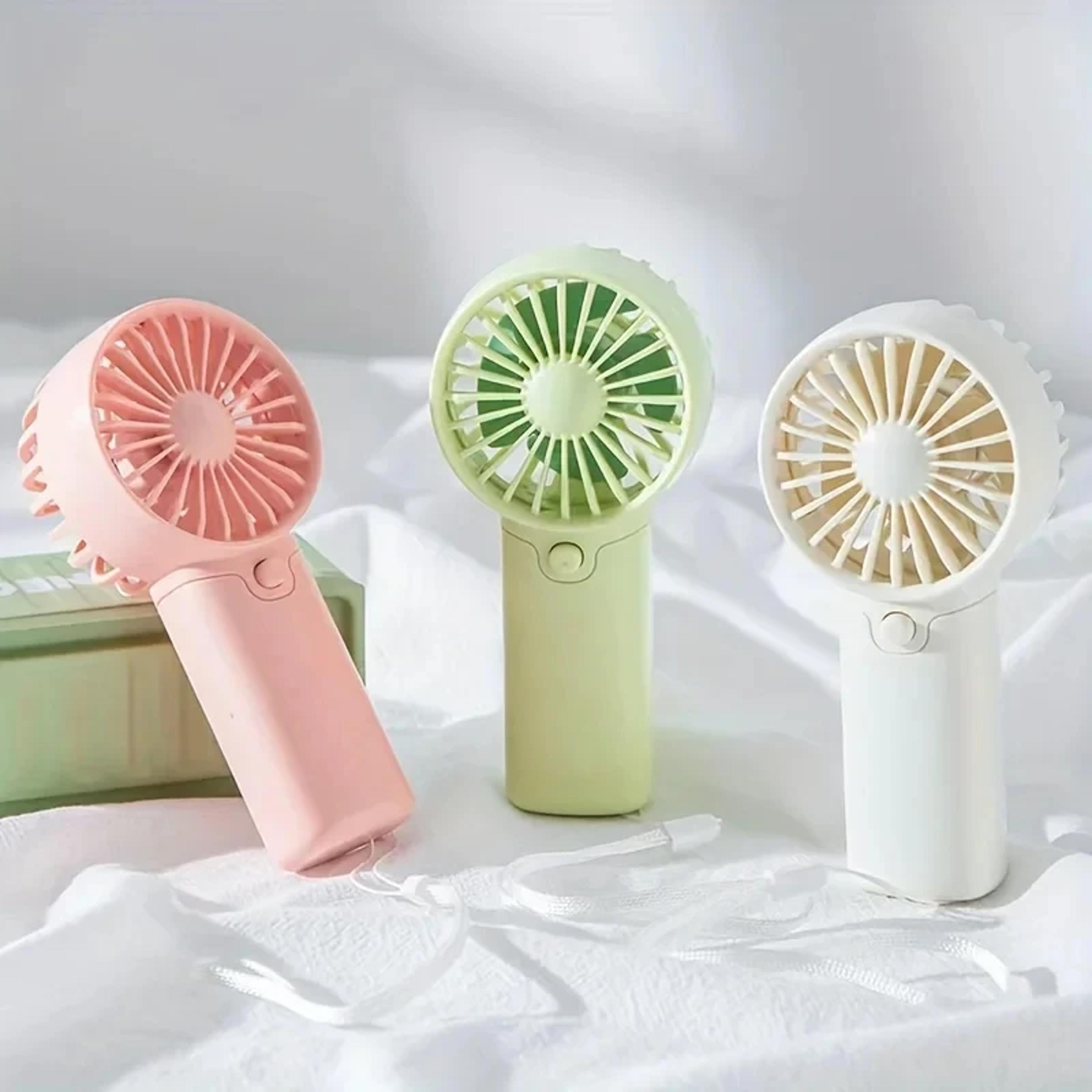 portable mini fan rechargeable handheld fan for travel and everyday cooling
